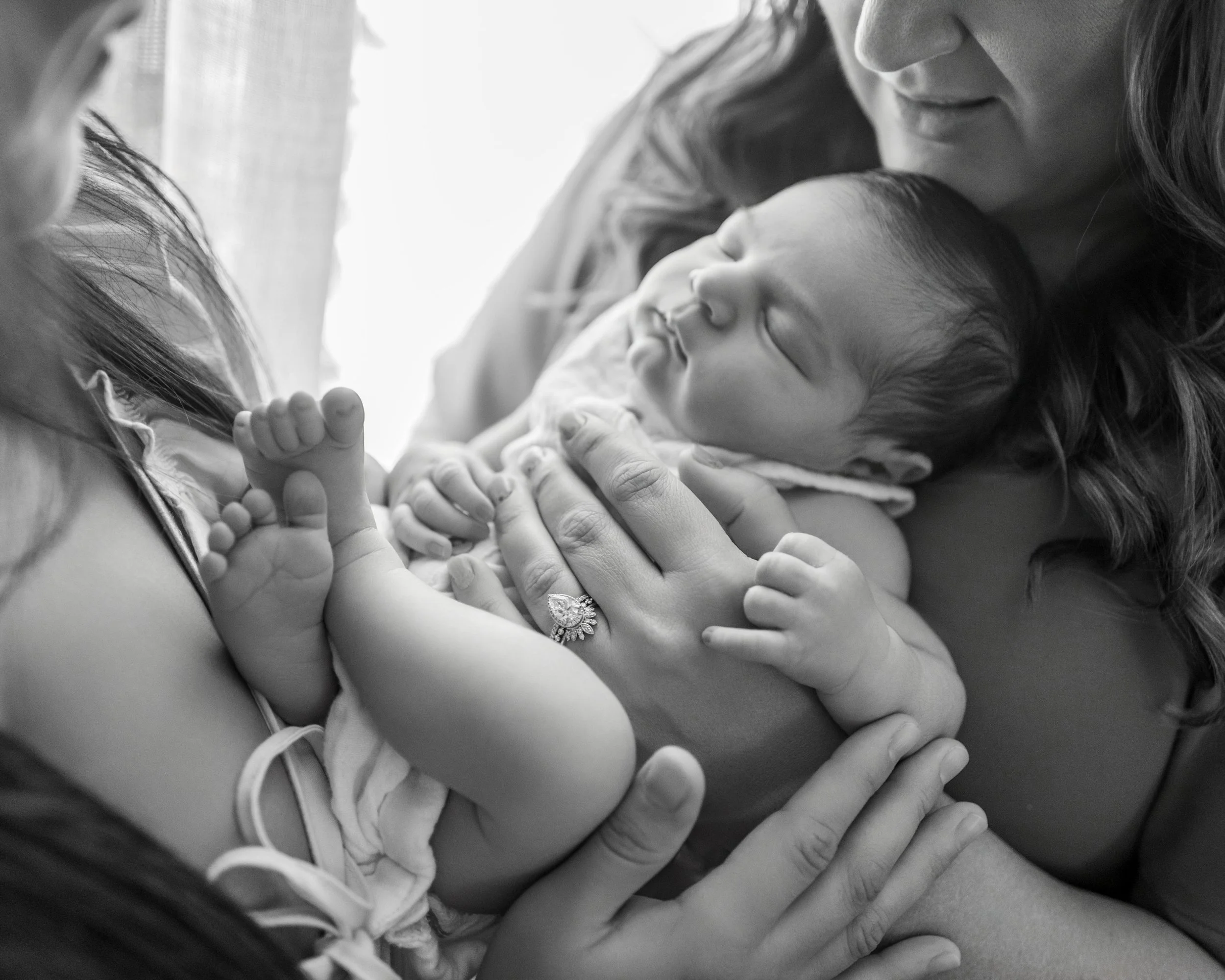 Moms holding baby Supply NC