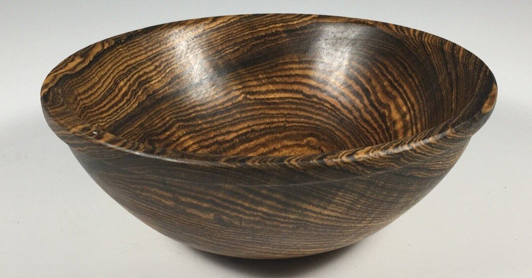 Bocote Bowl
3&quot; high by 7&quot; wide

This bowl was turned from Bocote, an exotic South American hardwood. The bowl is perfect for salads or holding fruit. A food safe finish preserves the wood which can be cleaned with a damp sponge and dried wi