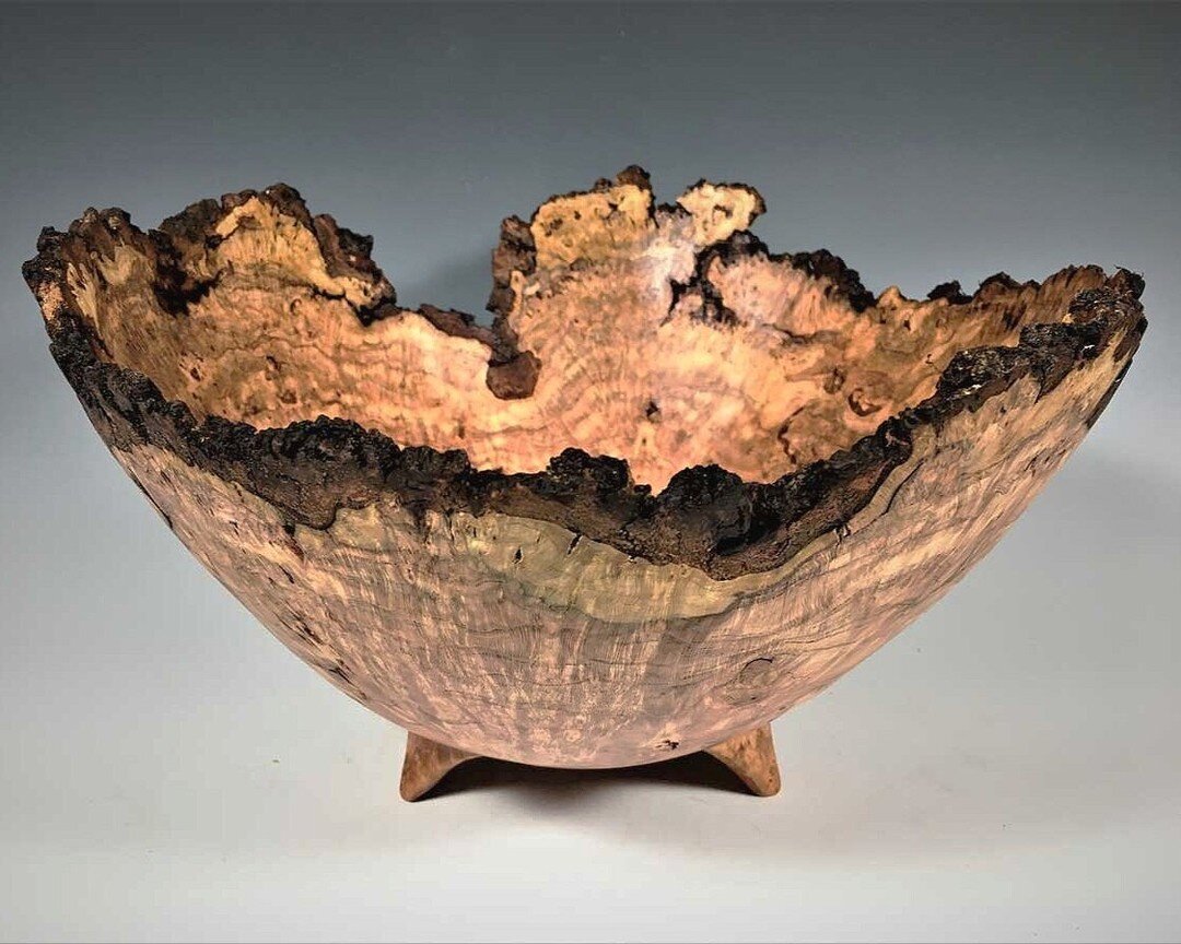 Cherry Burl Natural Edge Bowl with Carved Legs 2
6&quot; high by 11&quot; wide

Natural Edge bowls are created when one incorporates the natural contour of the tree's trunk into the rim of the piece, with or without the bark attached. A wipe on poly 