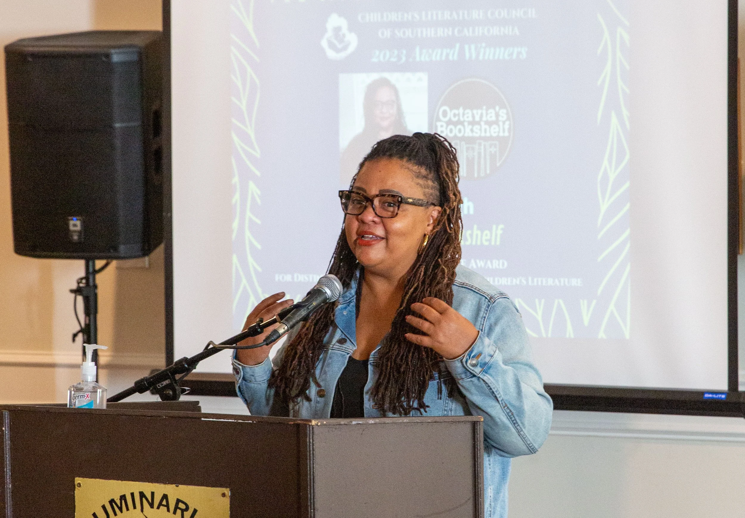Octavia's Bookshelf owner Nikki High gives her acceptance speech at the 2023 CLCSC Awards Ceremony. (Josh Steichmann)