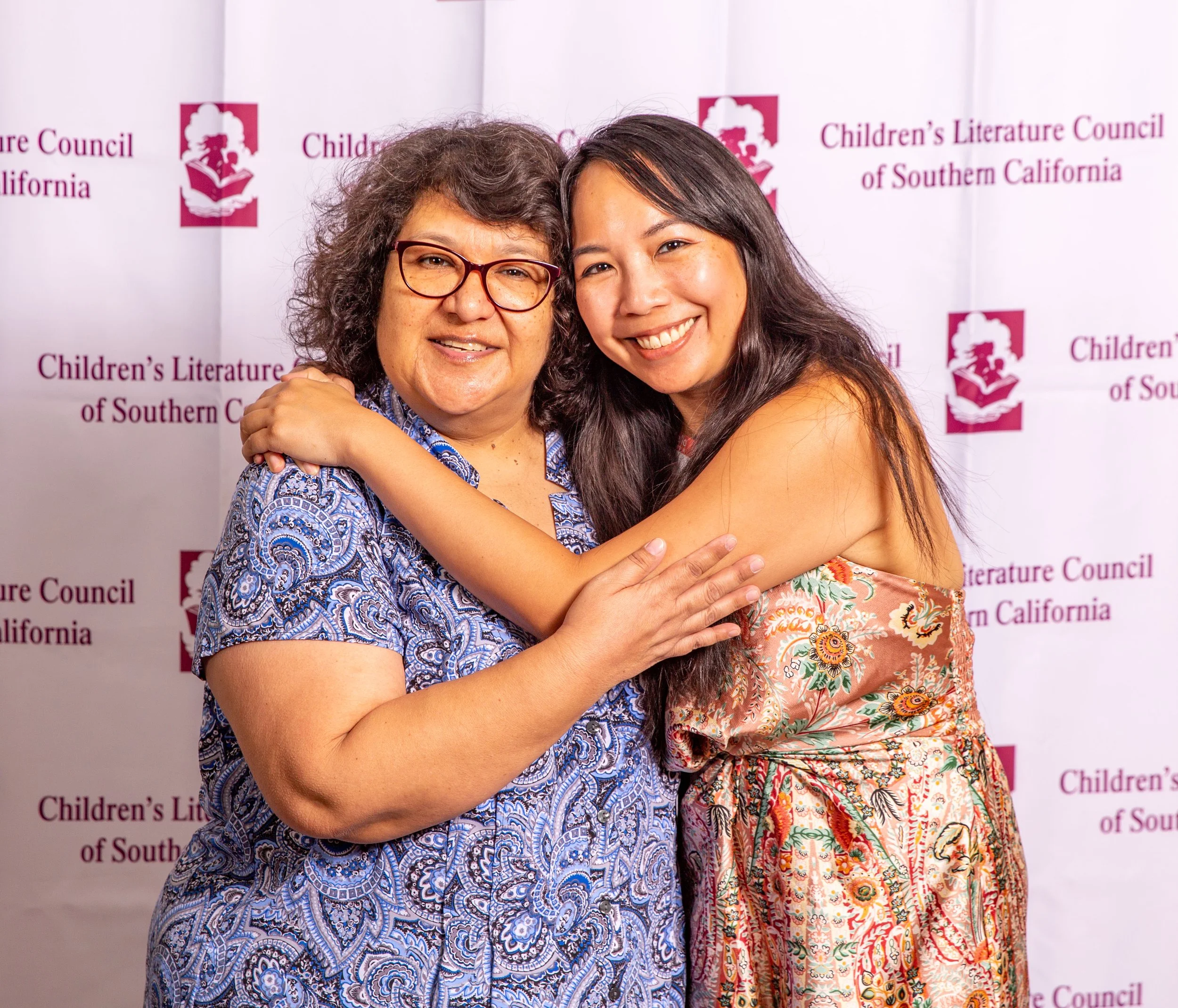 L to R: Diane Estrella and CLCSC Treasurer Joanna Fabicon share a hug (Josh Steichmann)