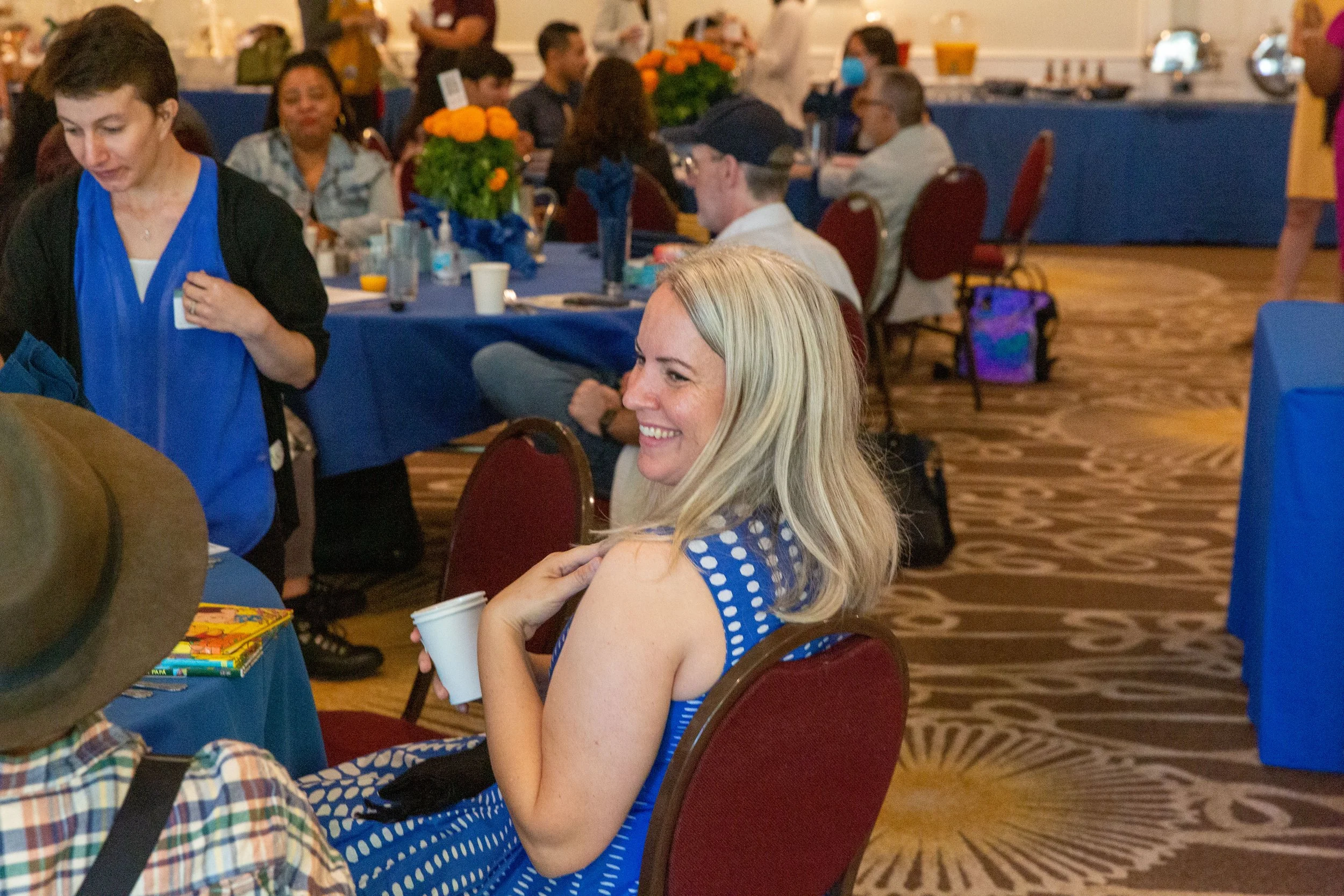L to R: CLCSC Board Member Annalisa Engh and Awards Committee Member Kadria Simons converse with others at their table. (Josh Steichmann)