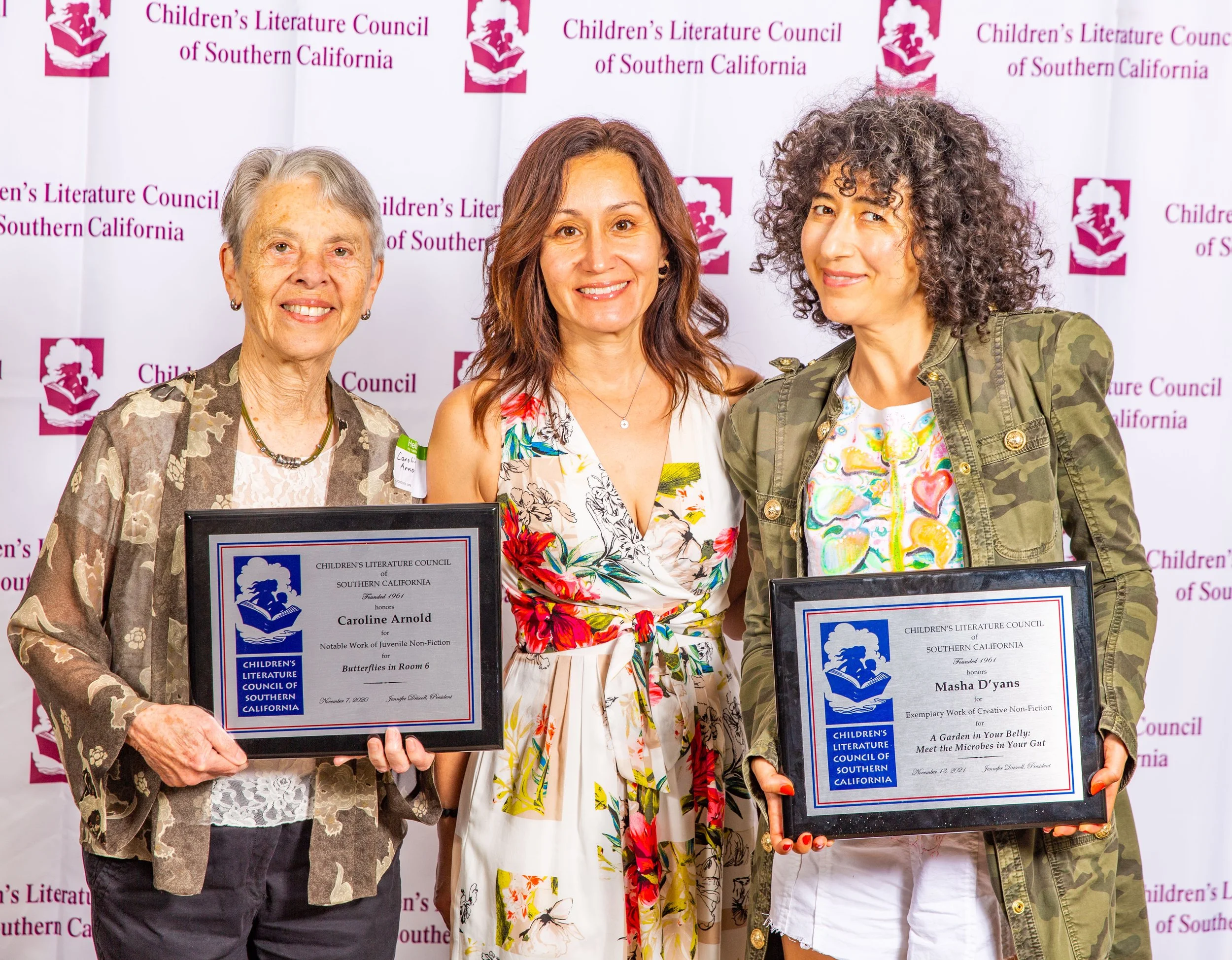 L to R: Award Winners Caroline Arnold (2020), Access Books representative Claudia Magana (standing in for Winner Dr. Rebecca Constantino, Ph.D, 2020 Dorothy C. McKenzie winner), and Masha D'yans (2021). (Josh Steichmann)