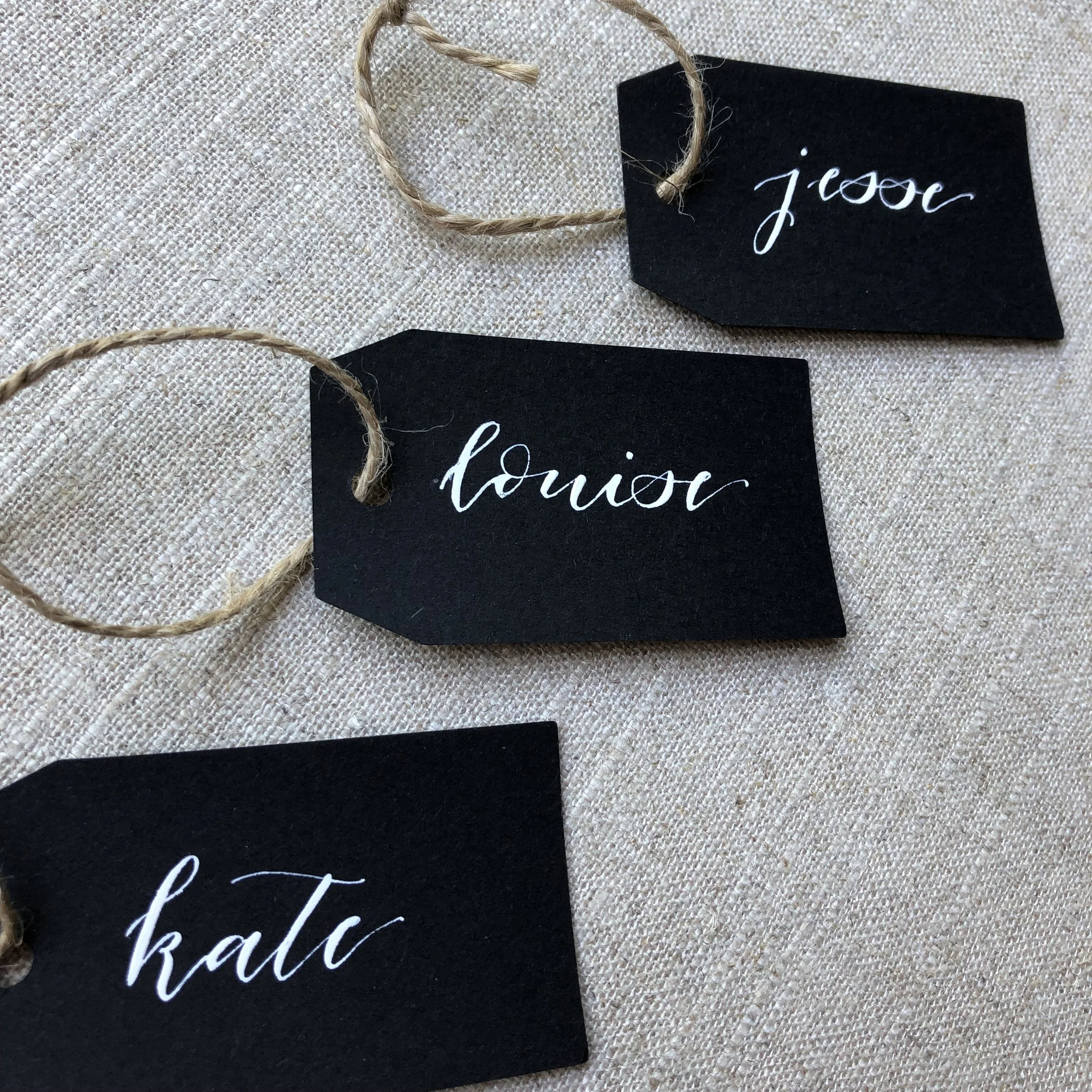 black and white handwritten nametags.jpg