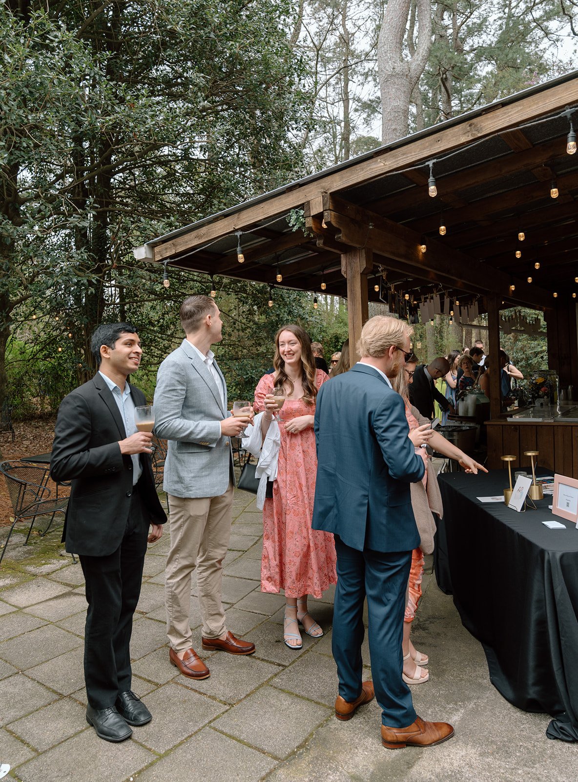 Wedding Guests Gather Around the artist