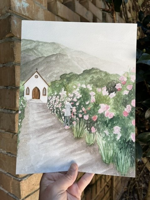 Watercolor Painting of a woman pruning rosebushes on a country lane