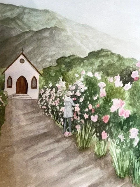 A woman is painted in watercolor standing along the lane in front of a white chapel