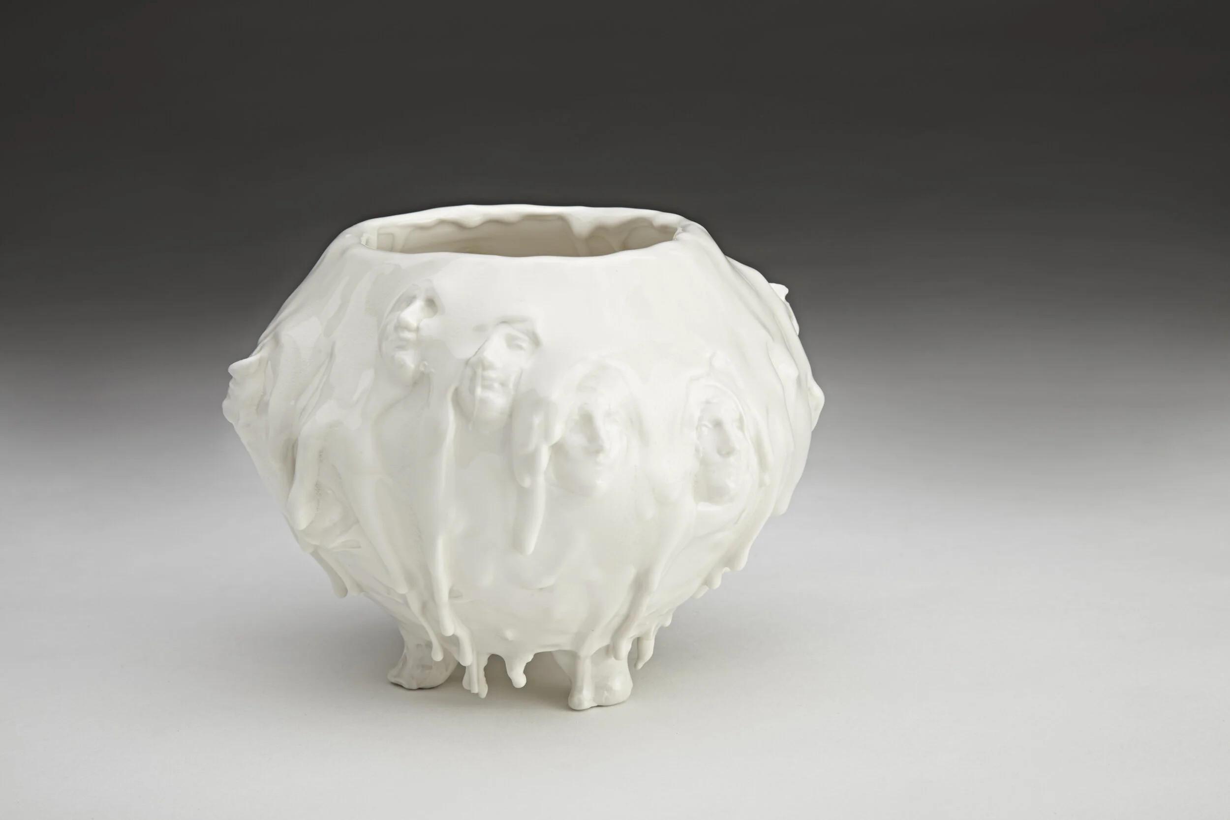 Melting Pot: Sphere.
Wheel-thrown porcelain vessel with relief and liquid clay detail.