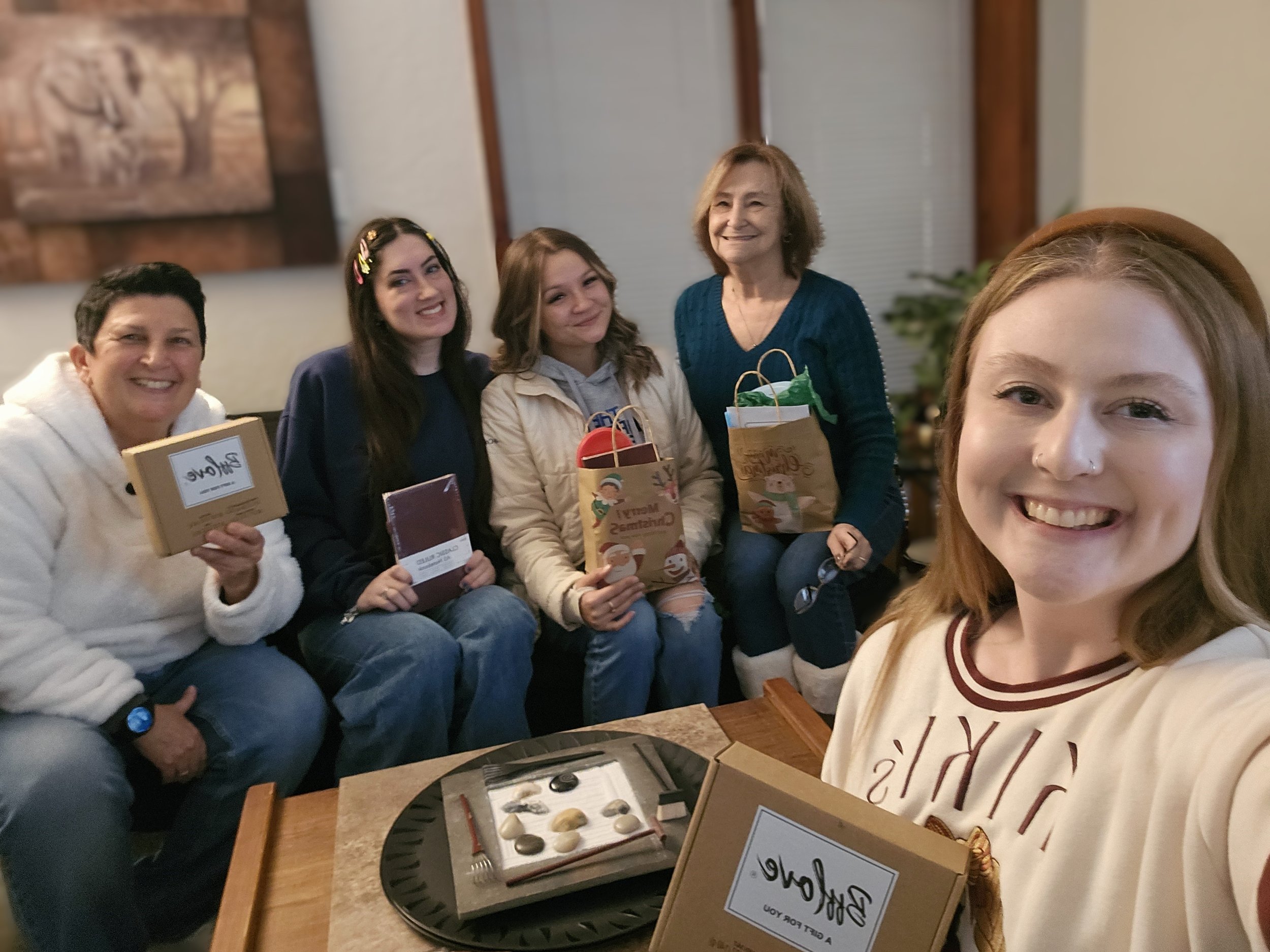 Staff pic with Holiday gifts from the Board.jpg