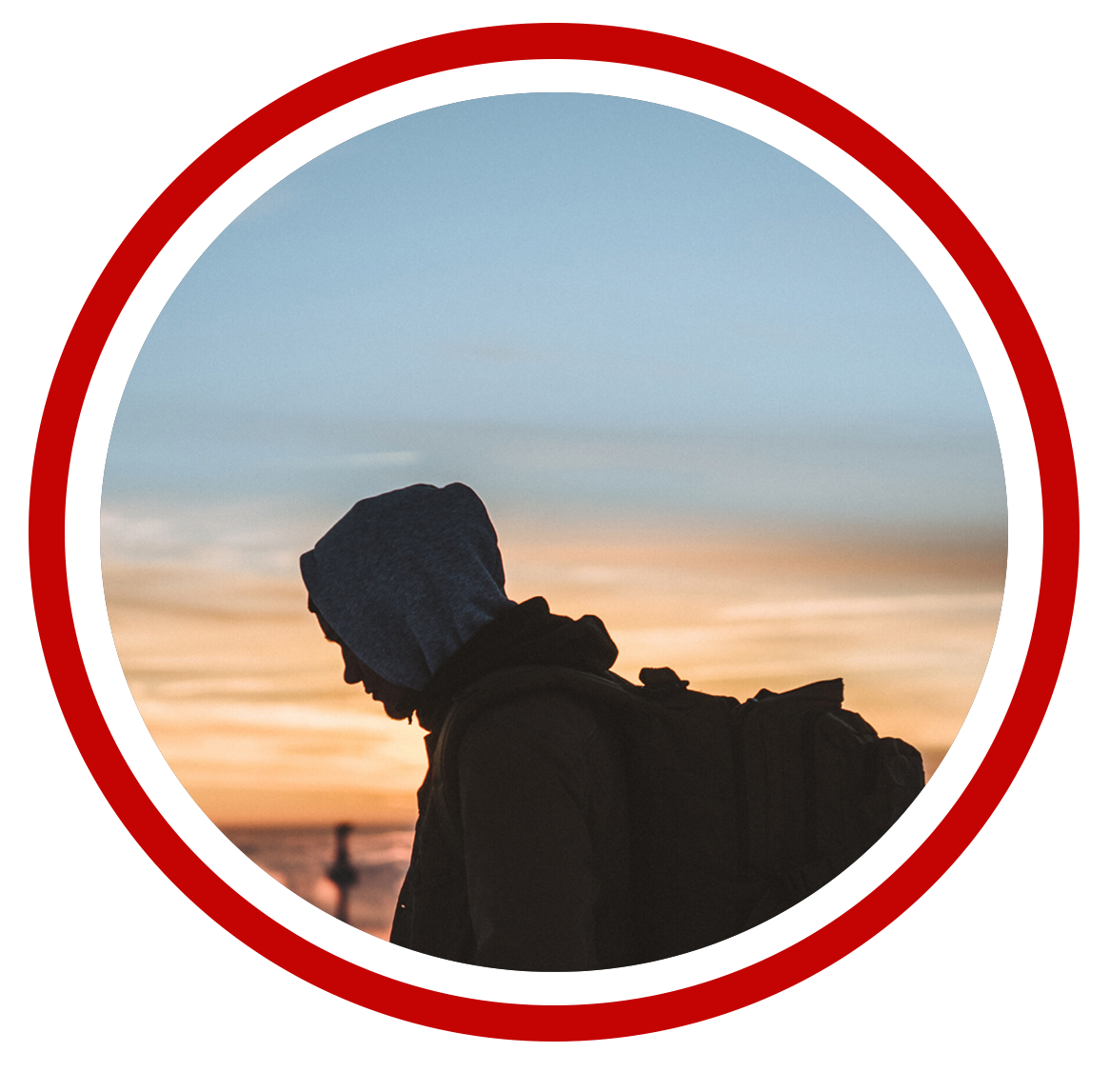 SILHOUETTE OF A MAN WITH A BACKPACK
