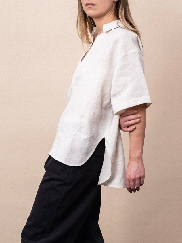 The Clerkenwell V-Neck Shirt 

A minimal reworking of the classic over shirt. Cut with a graphic V neck with a relaxed silhouette and made in London from a soft organic cotton. 

 Ideal for the warmer summer days. 

New stock available now, or made t