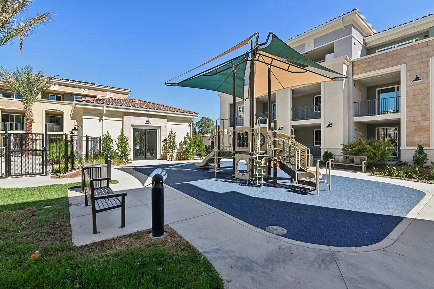 Play park at Rendezvous Phase II under shade sail for comfort