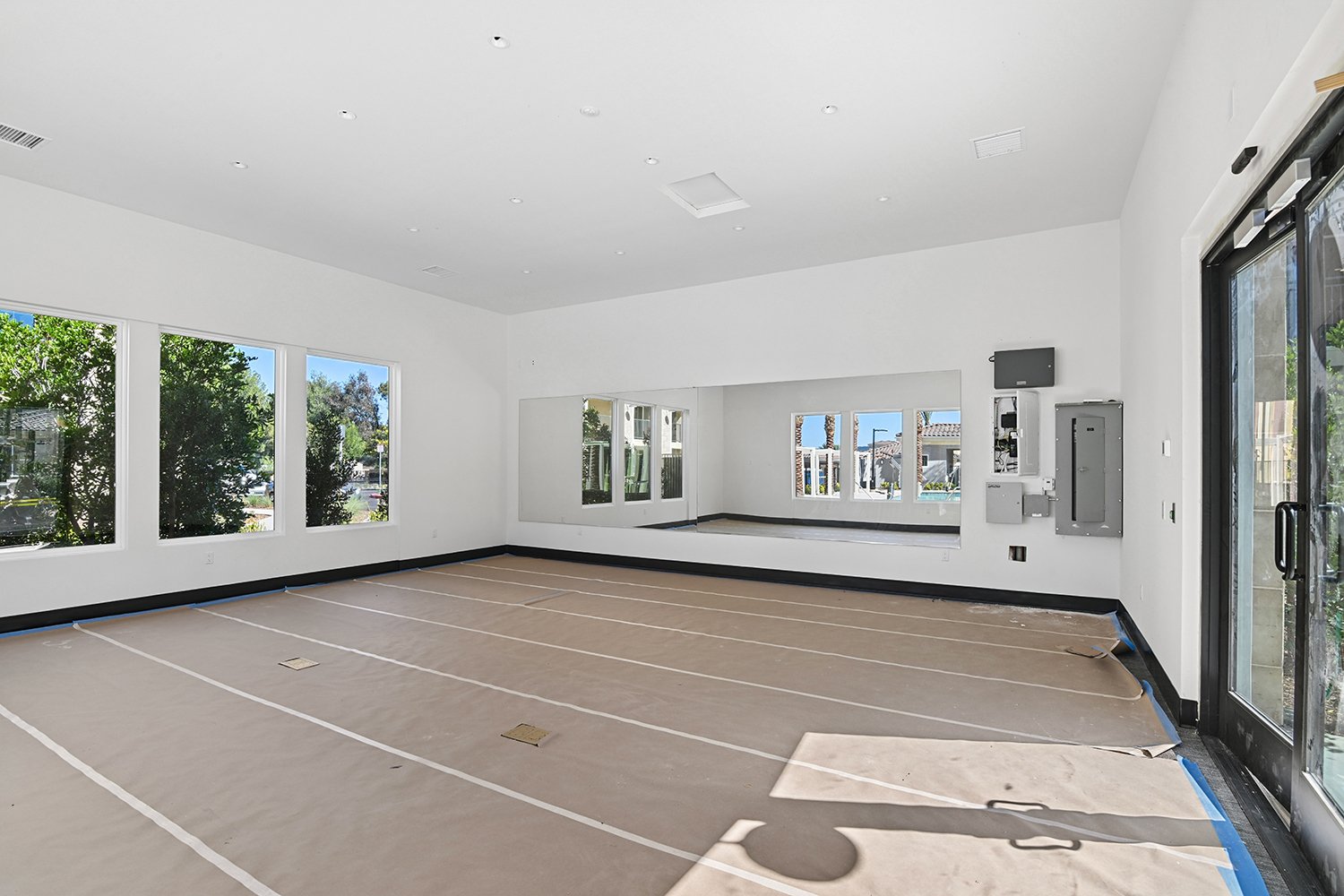 FItness center space at Rendezvous Phase II overlooking the pool area. This space is still undergoing construction. 