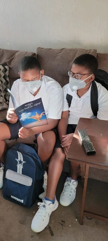 Idris and the Boys 12-5-21.jpeg