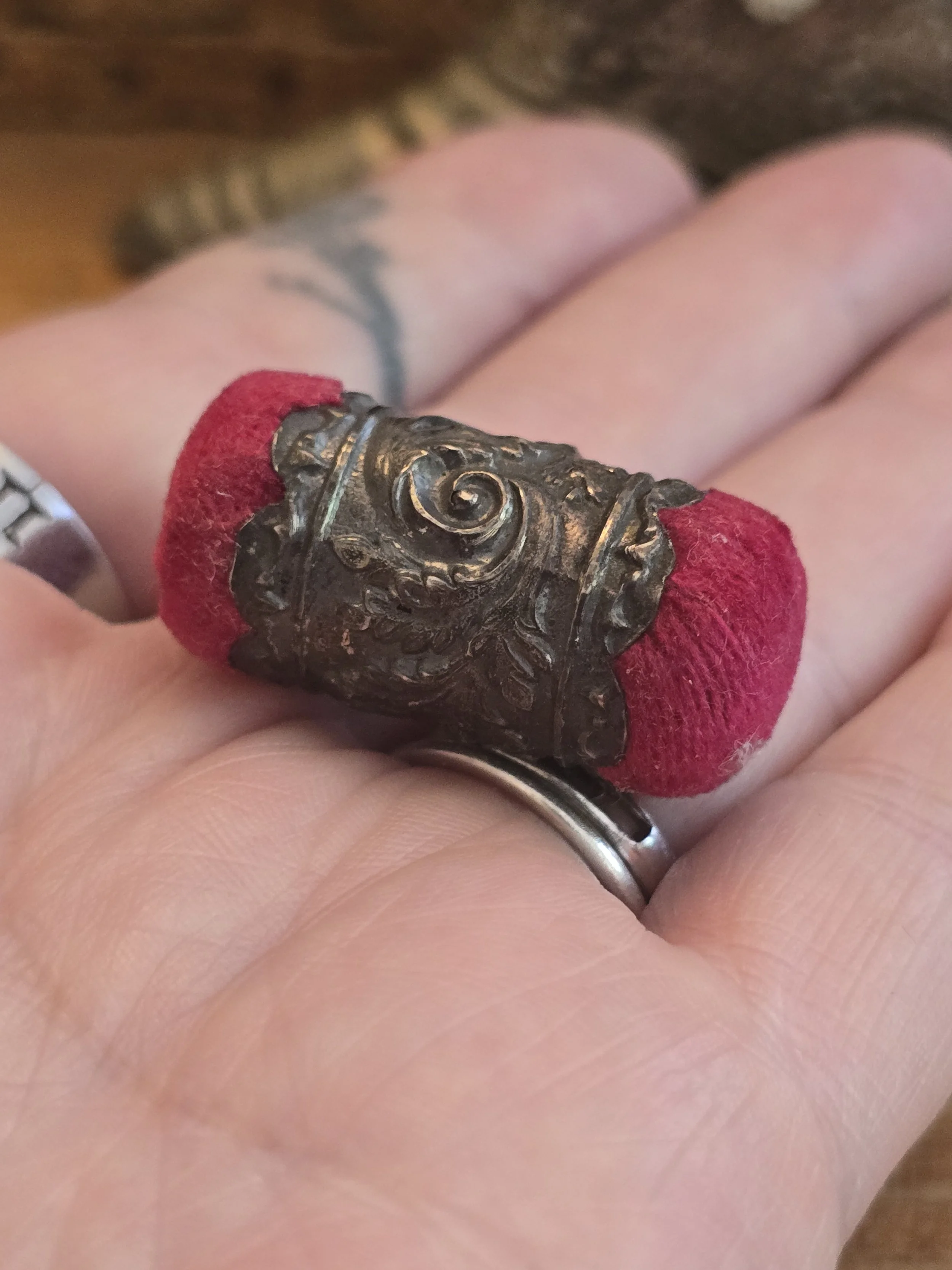 Decorative Victorian sewing curiosity with aged patina and original construction.