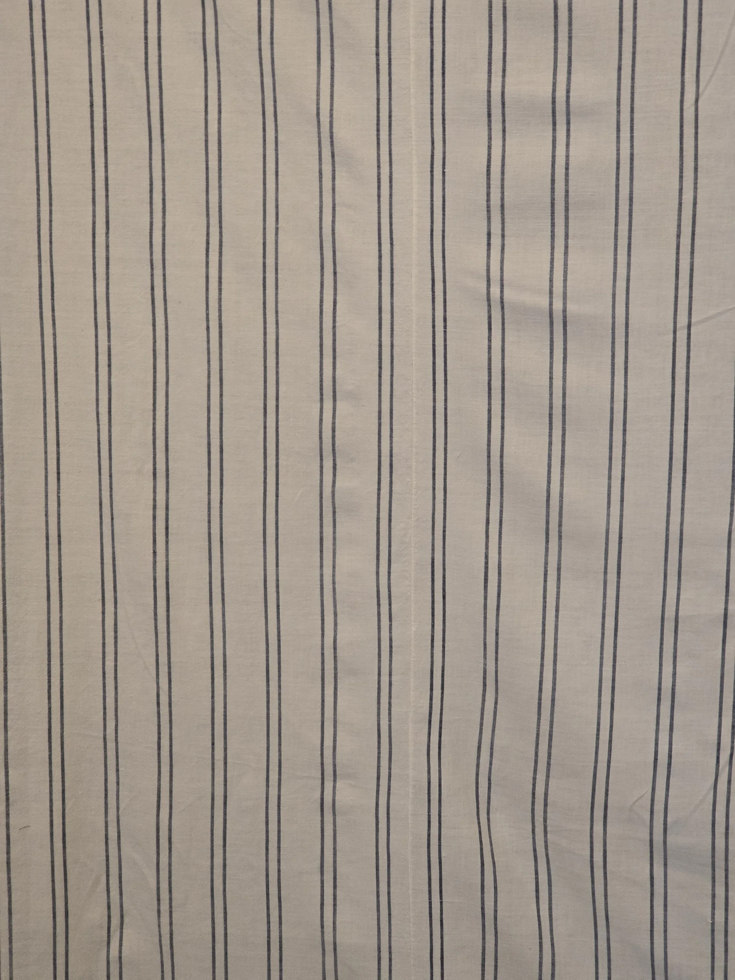 Full view of the antique pieced cotton sheet measuring 175 x 249 cm.