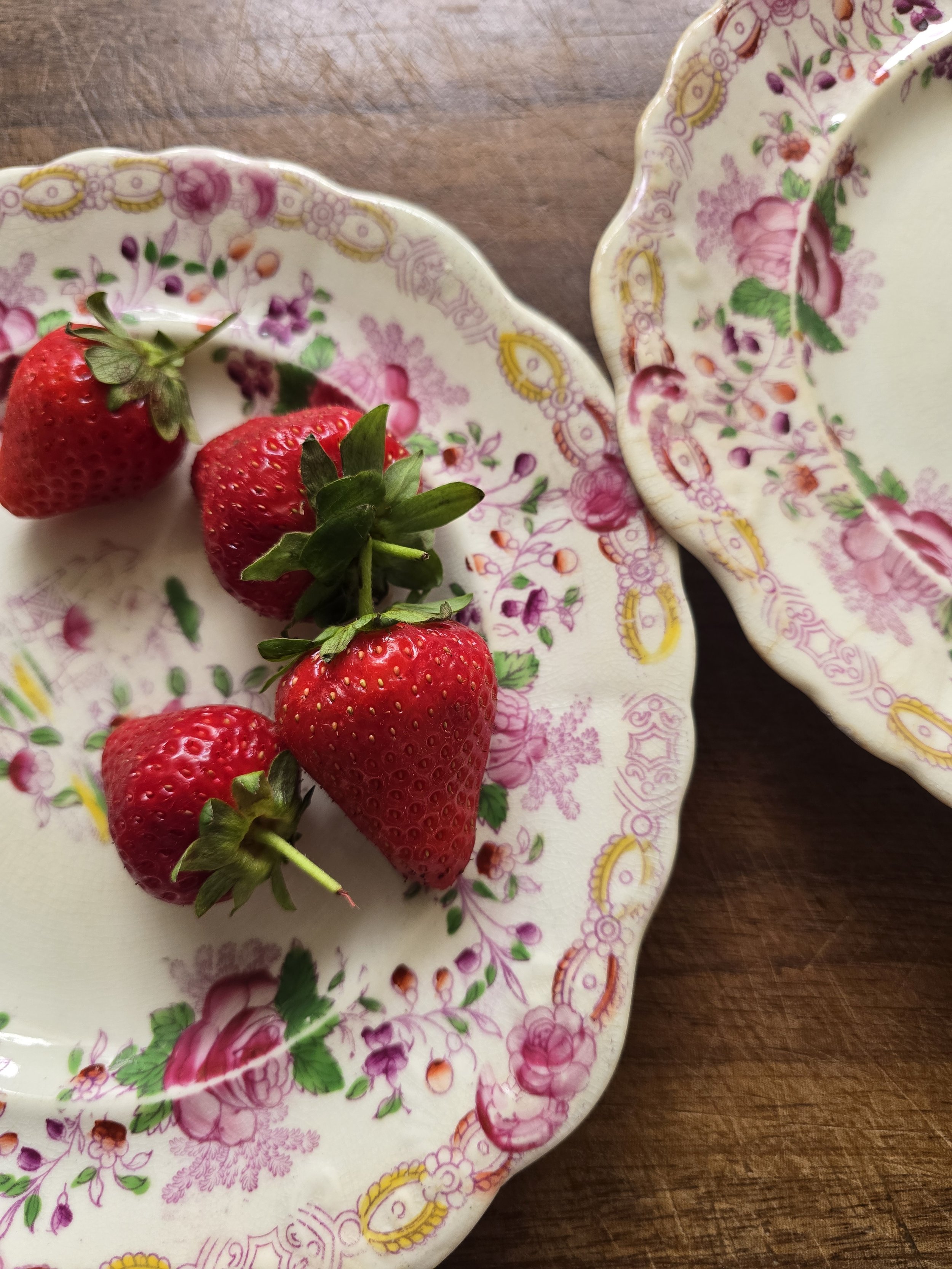 Victorian floral transferware plate with pink rose border and scalloped rim.