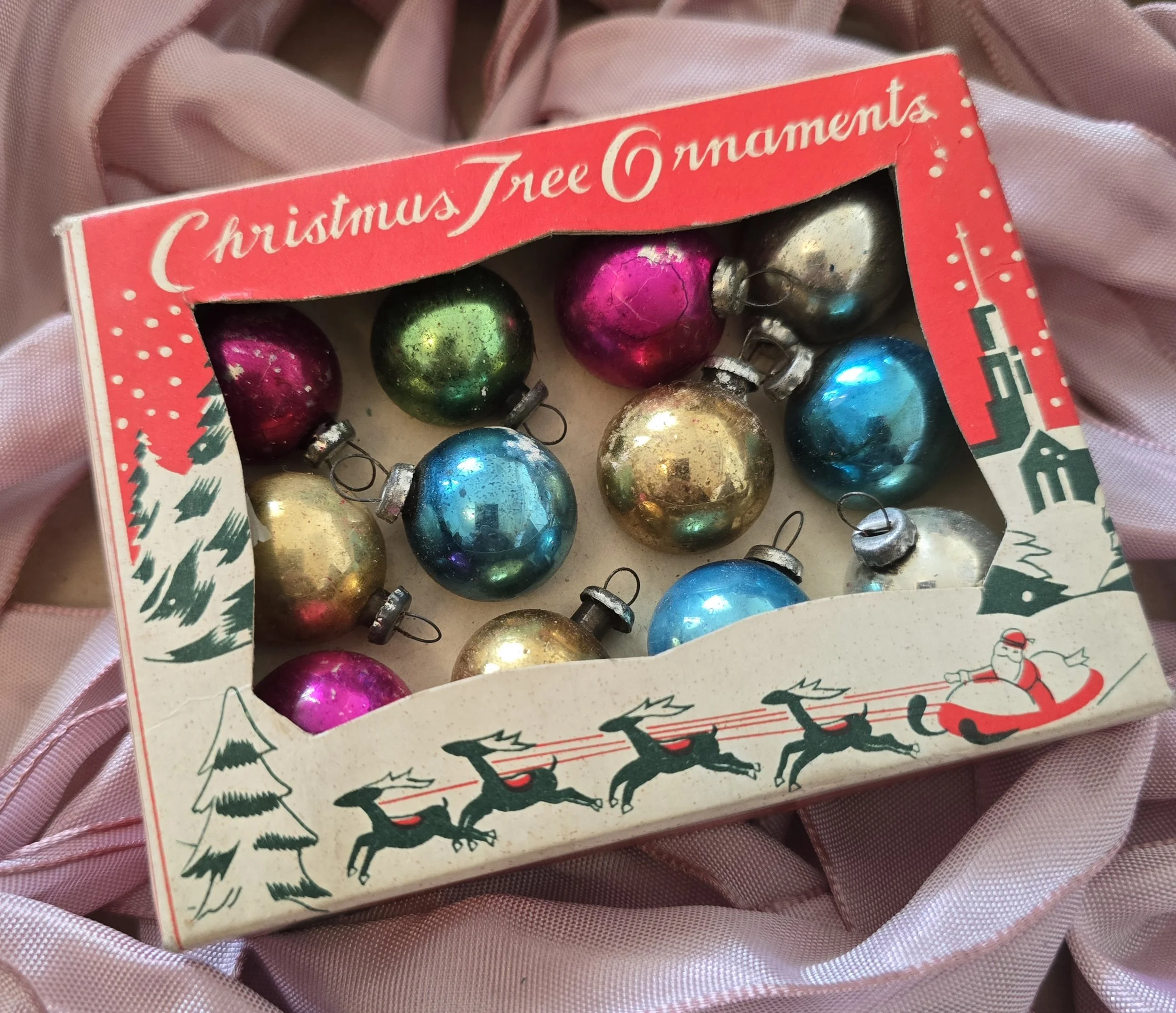 Original vintage Christmas tree ornaments box with twelve colourful miniature glass baubles.