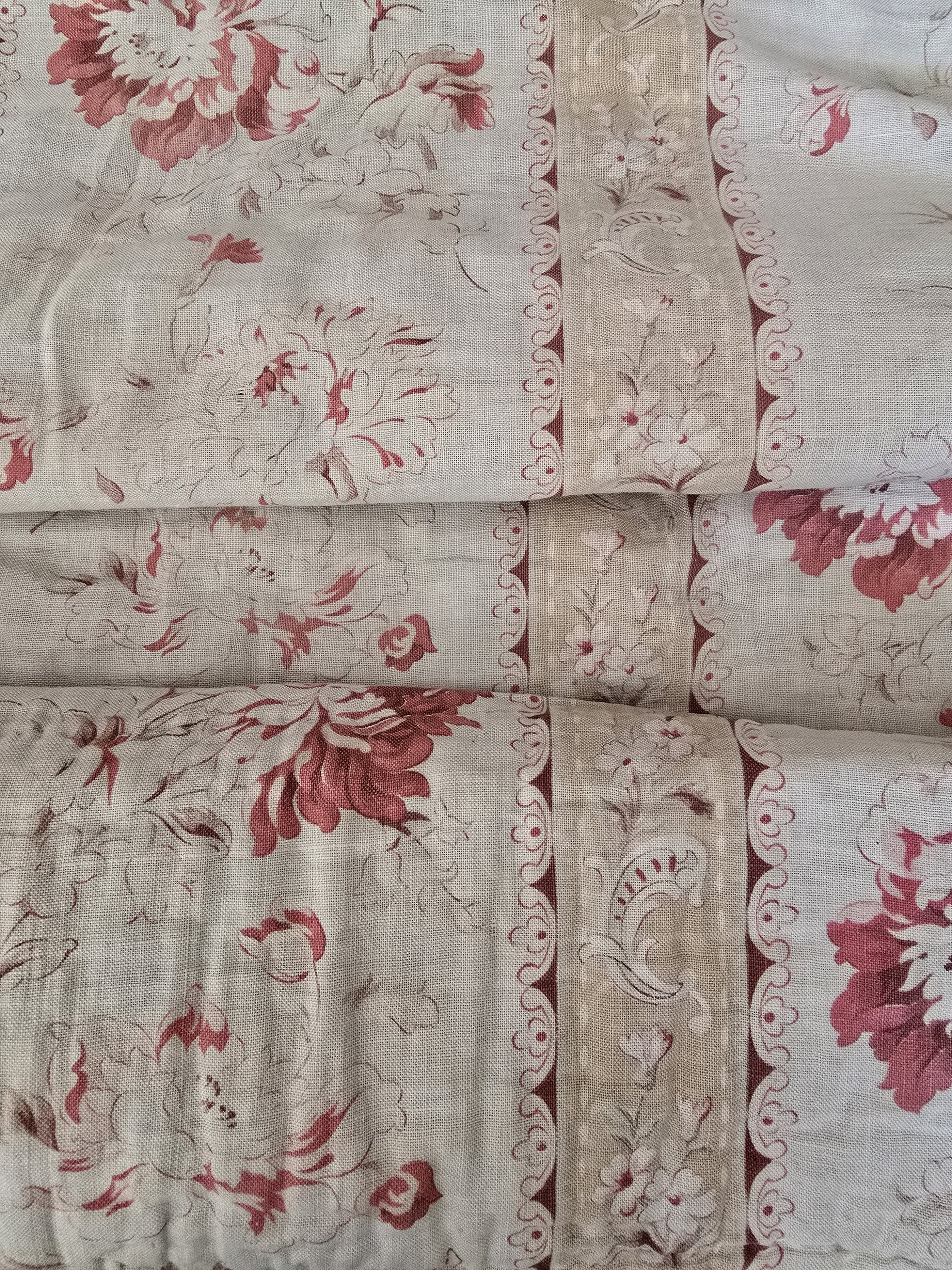 Antique quilt remnant with floral sprays and taupe ribbons
