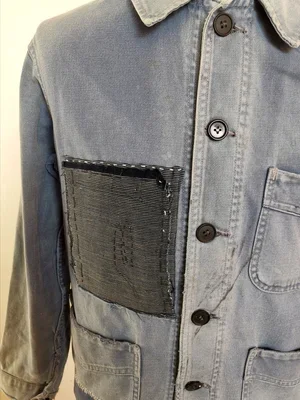 Pocket reinforcement with sashiko hand stitching detail