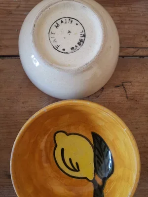 Base stamp reading Fait Main Nabeul on vintage Tunisian hand painted pottery bowl