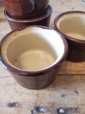 Overhead view of Moira Pottery ramekins showing speckled interiors