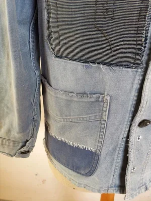 Close-up of pocket with layered patch and visible stitching
