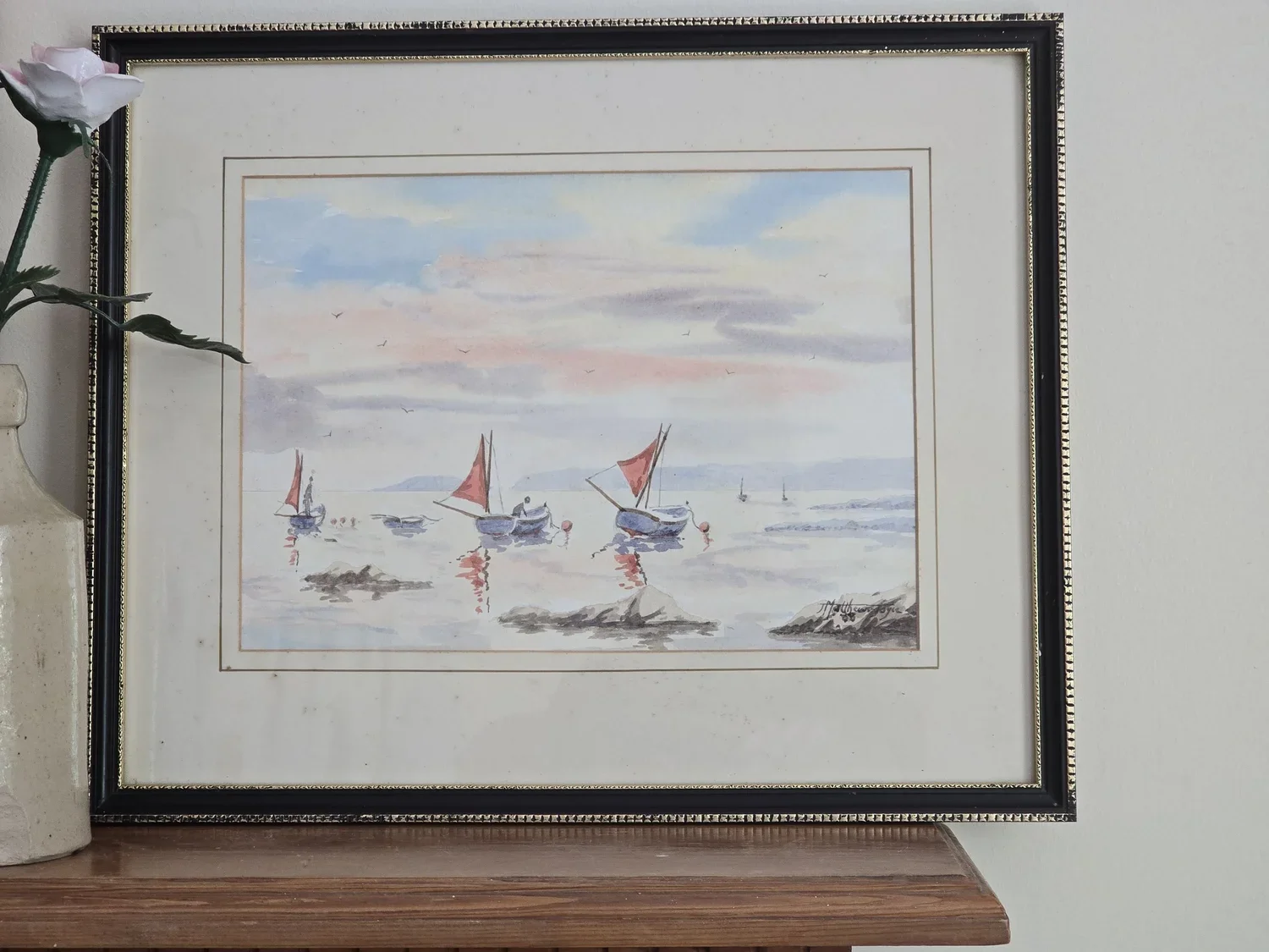 Full framed view of vintage 1980s Downderry Beach watercolour painting with boats and red sails, coastal scene in muted tones