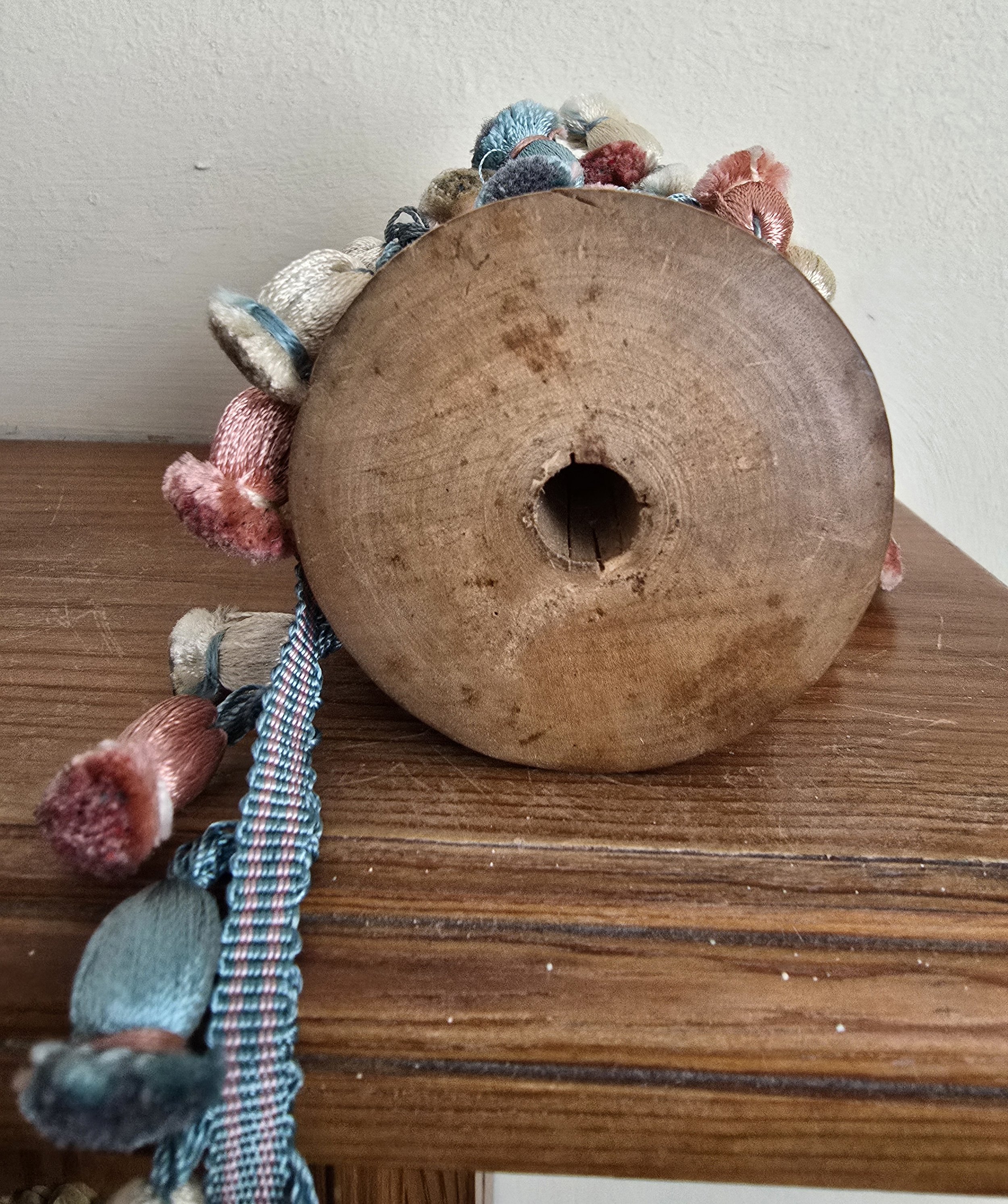 vintage haberdashery trim featuring soft silky tassels in faded sorbet tone