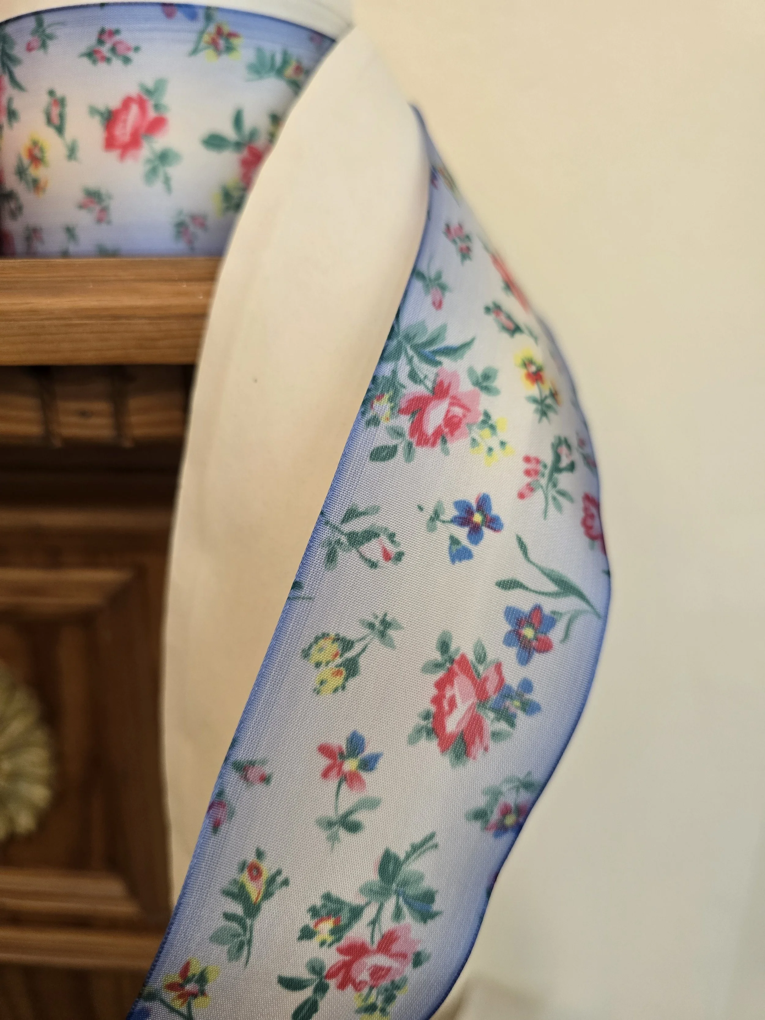 pale blue ribbon with scattered vintage floral motifs