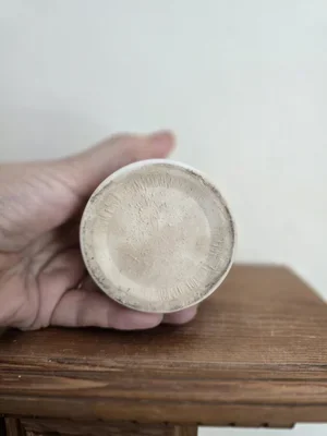 underside of the crock showing unglazed base.