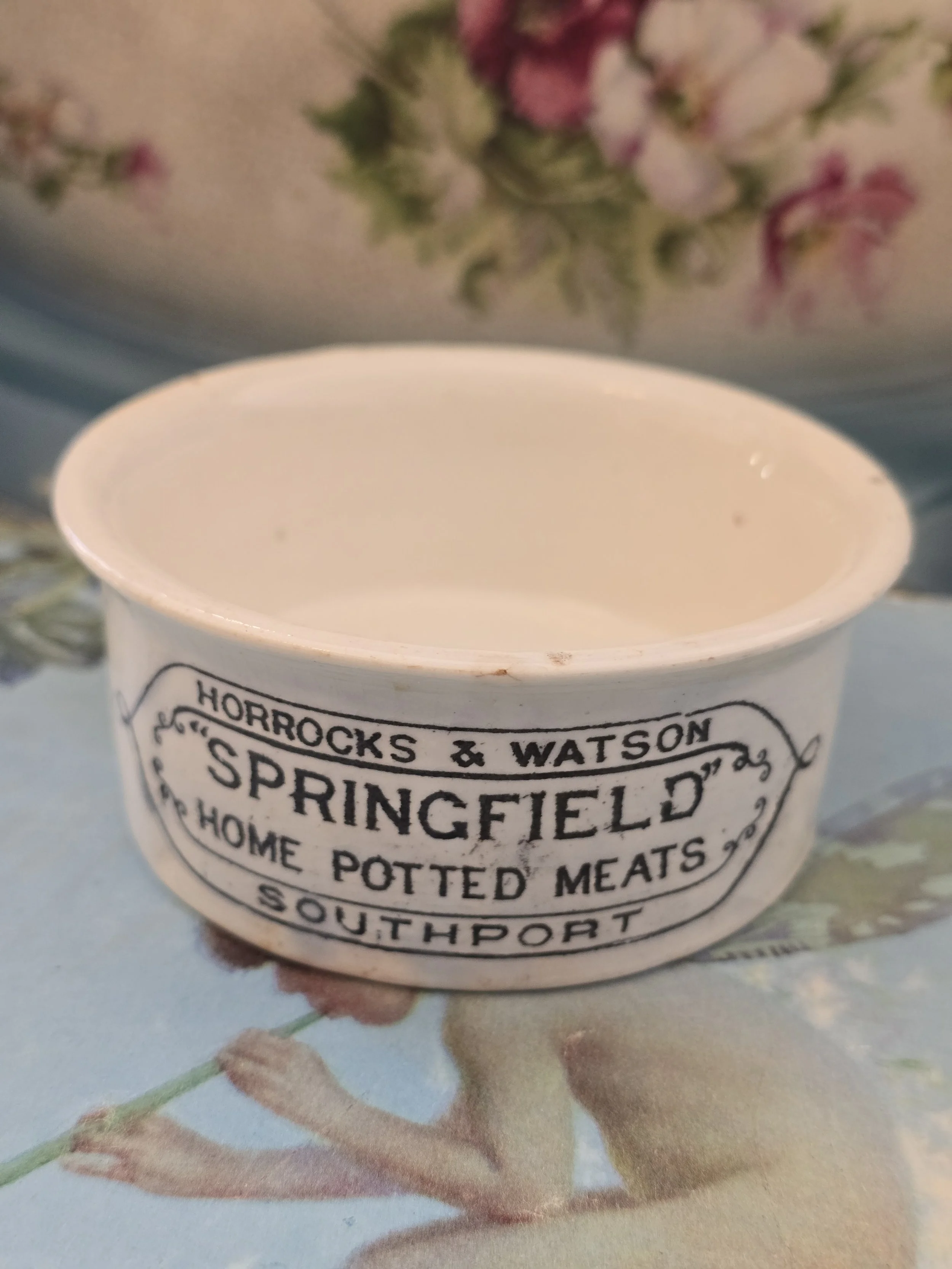 Front view of antique Springfield Home Potted Meats advertising pot from Southport.