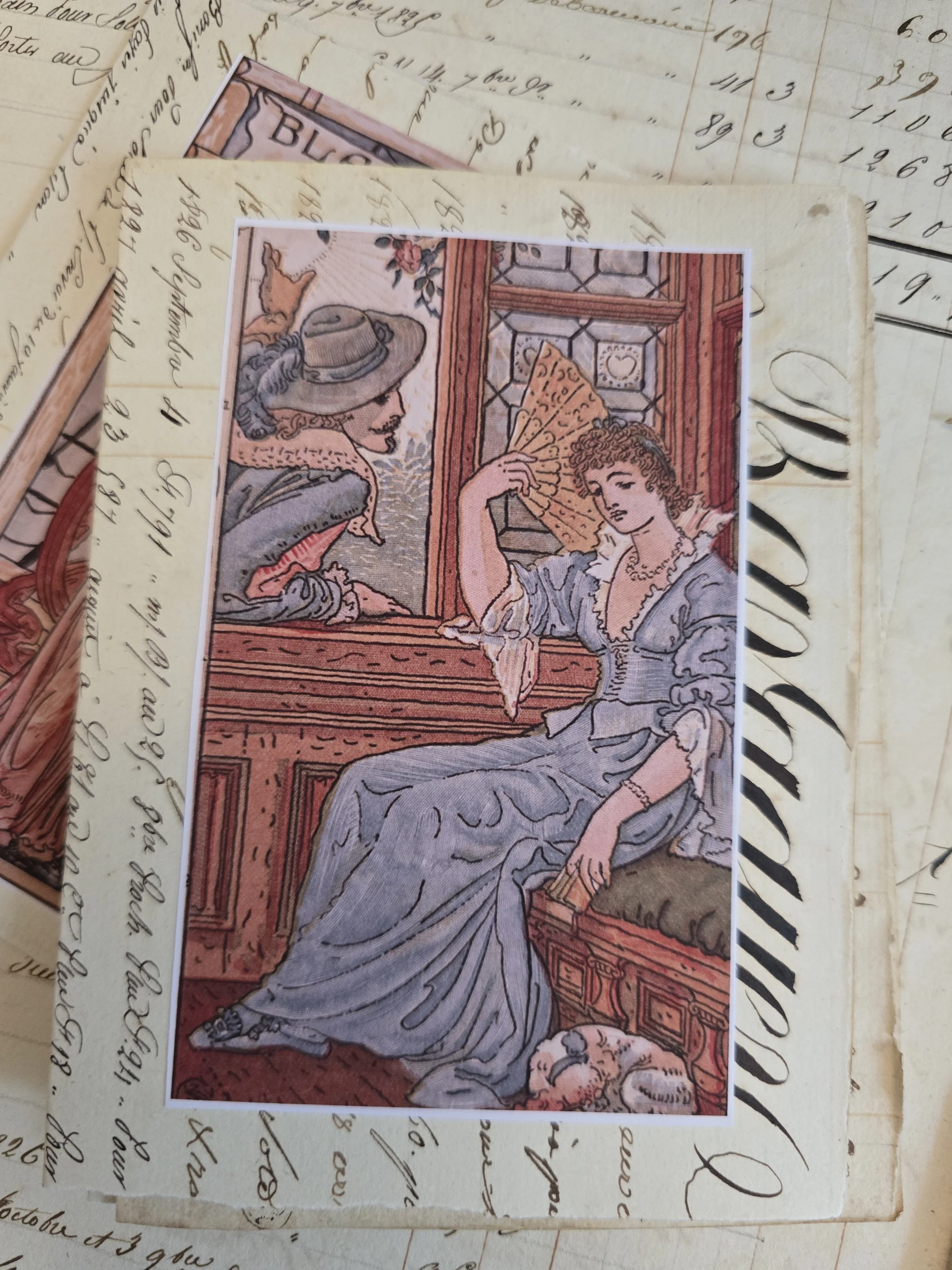 Handmade antique paper card with a period-style illustration of a seated woman holding a fan, mounted on handwritten 1829 French ledger paper.