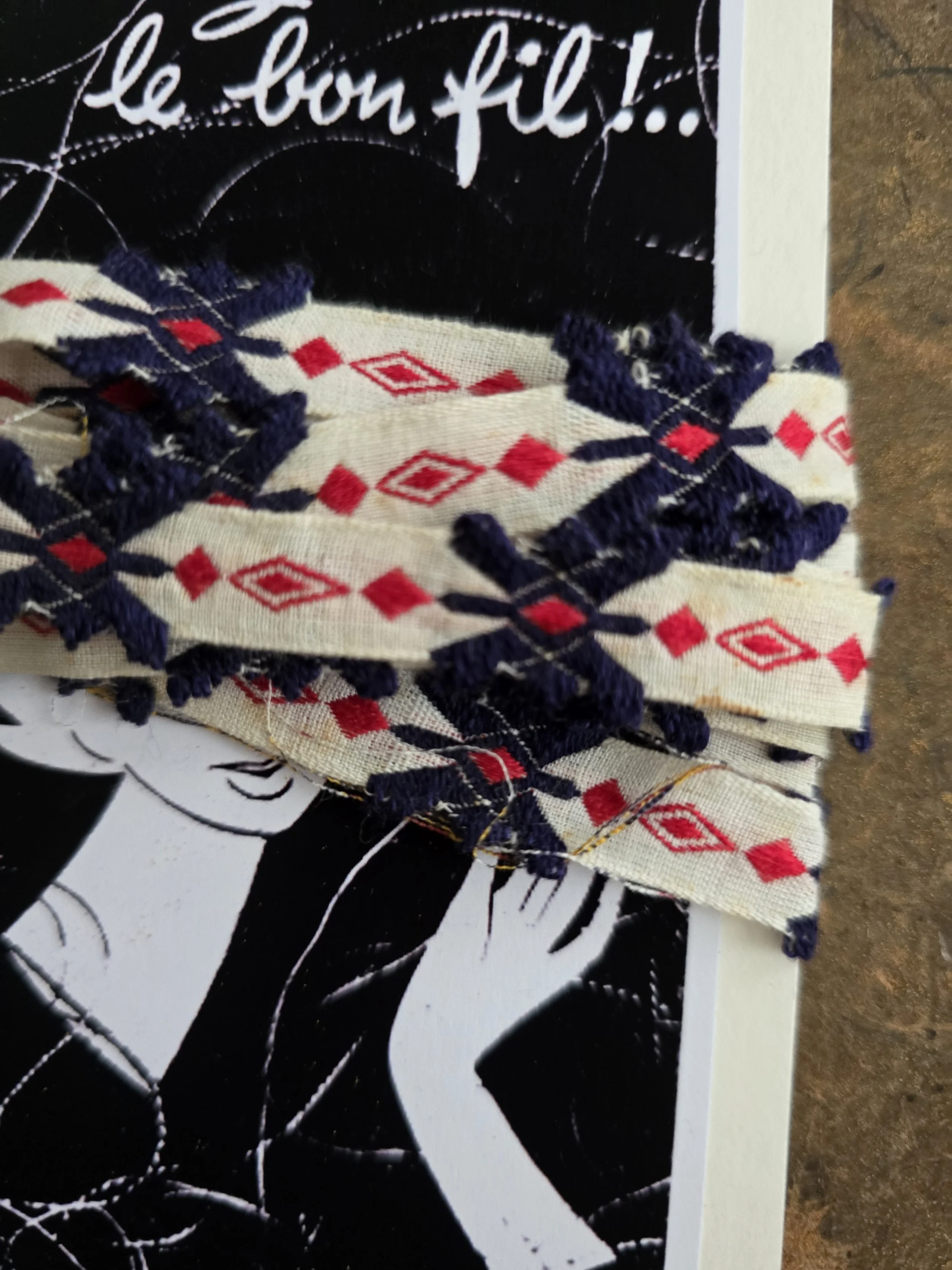 Vintage French woven trim in navy blue, red and cream, presented on a handmade card using an old French image.
