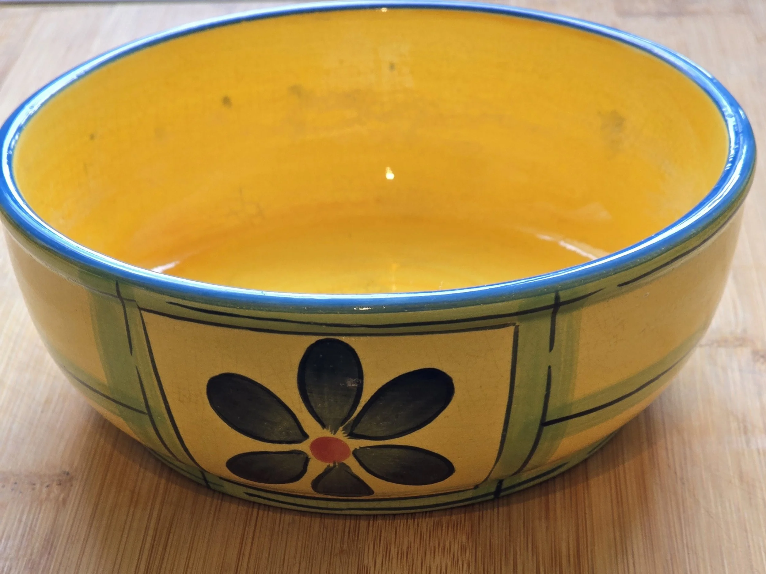 Vintage Casa Colori yellow ceramic bowl with blue rim
