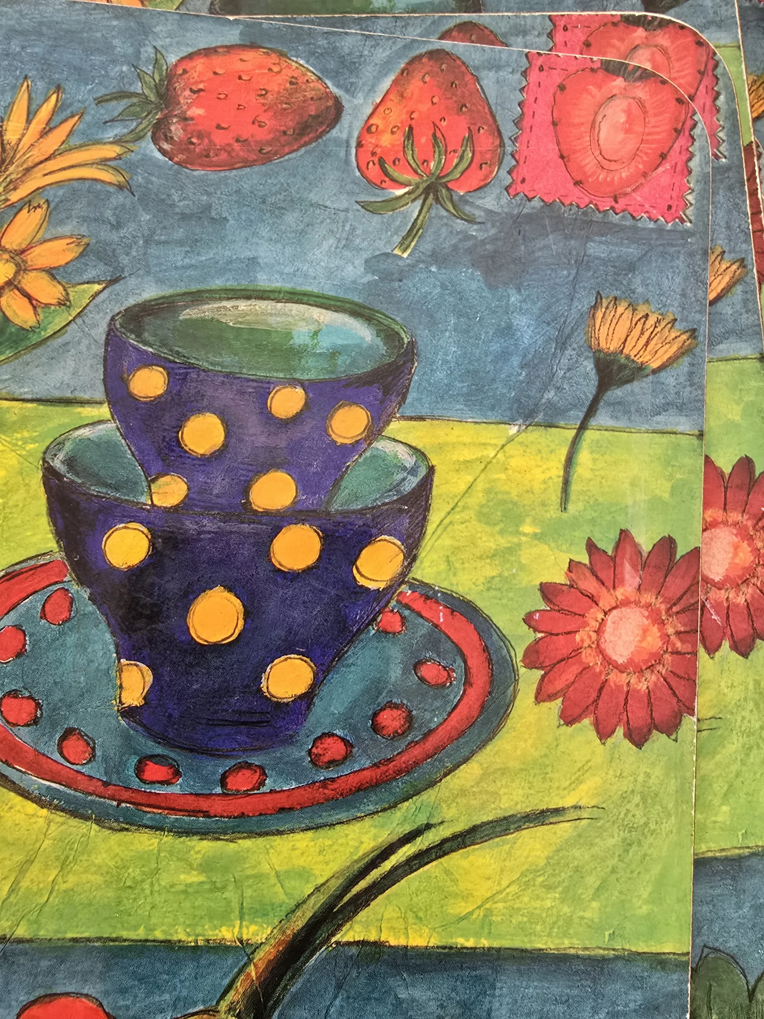 Colourful Roger la Borde placemats styled for vintage kitchen table
