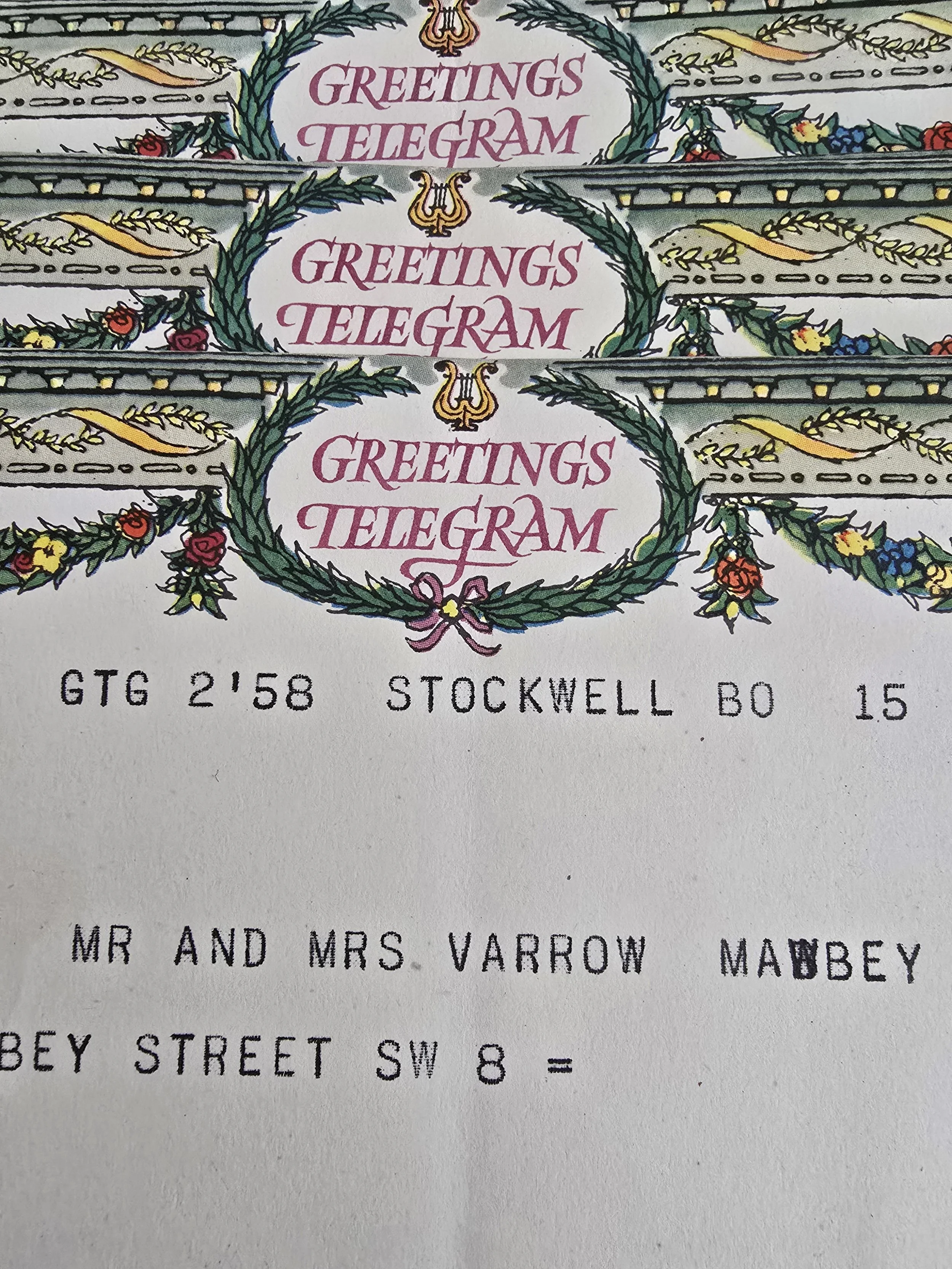 Close-up of a vintage 1958 British Greetings Telegram showing Stockwell postmark and typewritten message