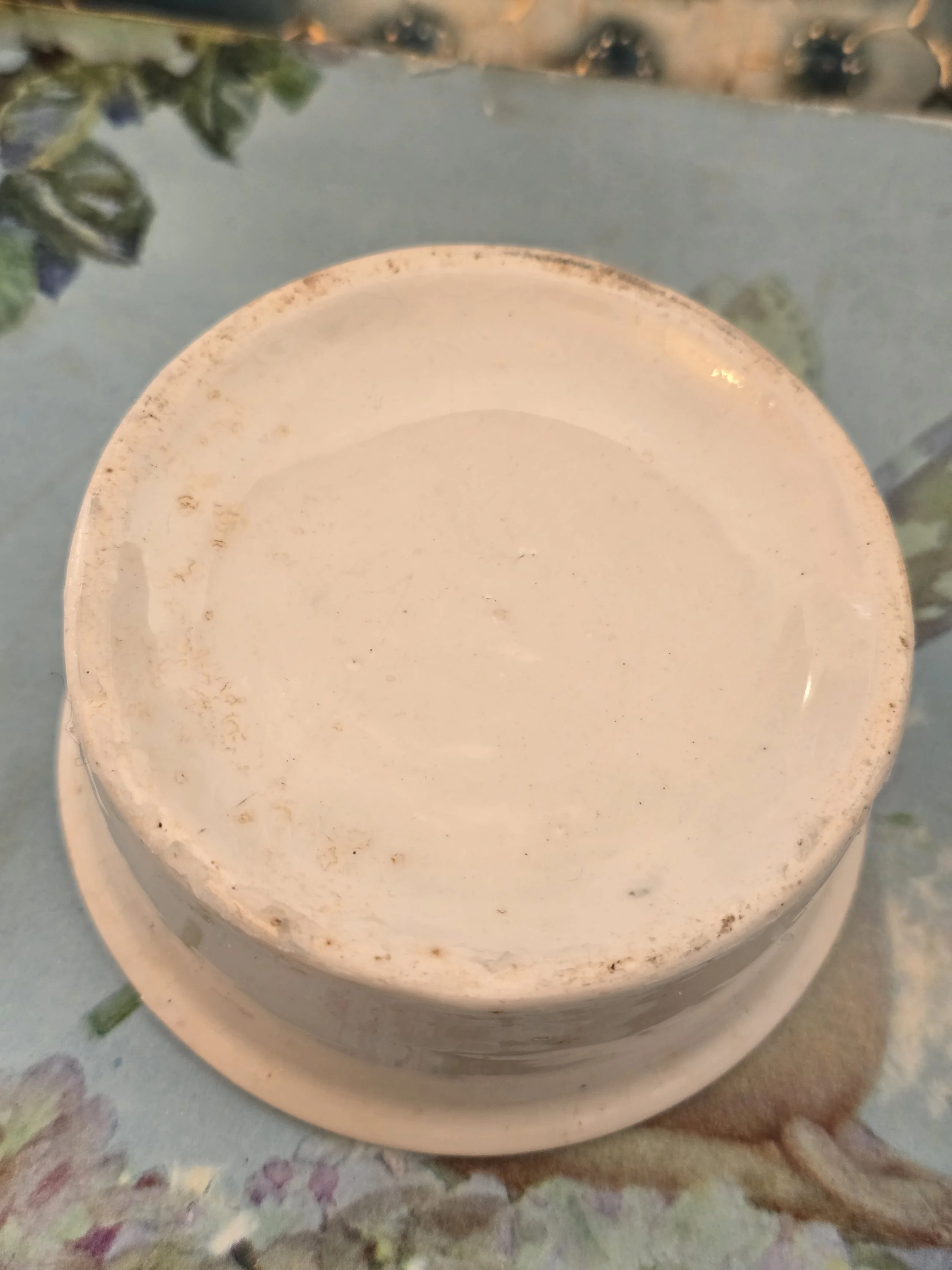 Underside of antique Horrocks and Watson pot showing wear and marks to the base.