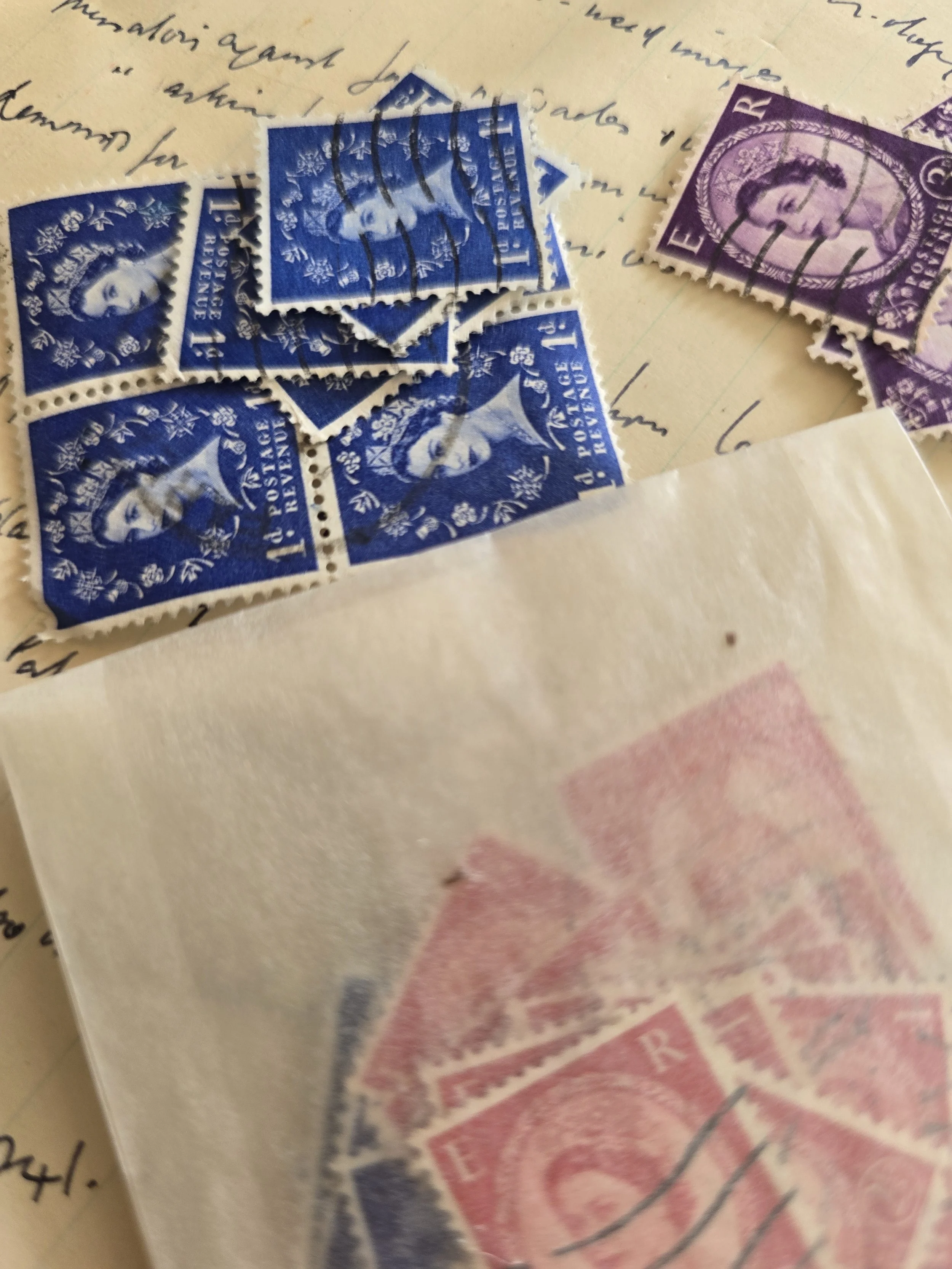 Original used British stamps presented in a paper packet