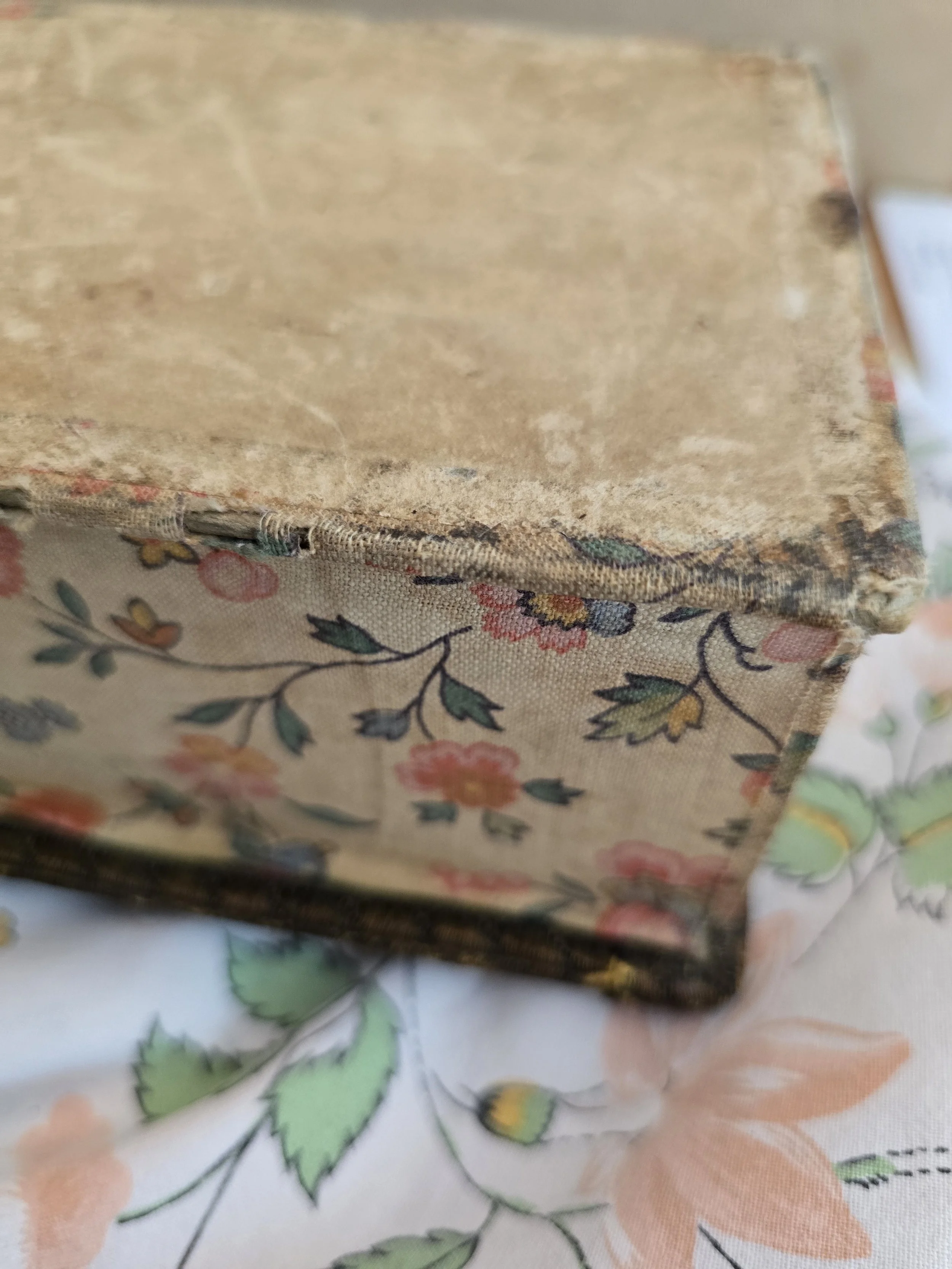 base of vintage floral covered bos showing original construction