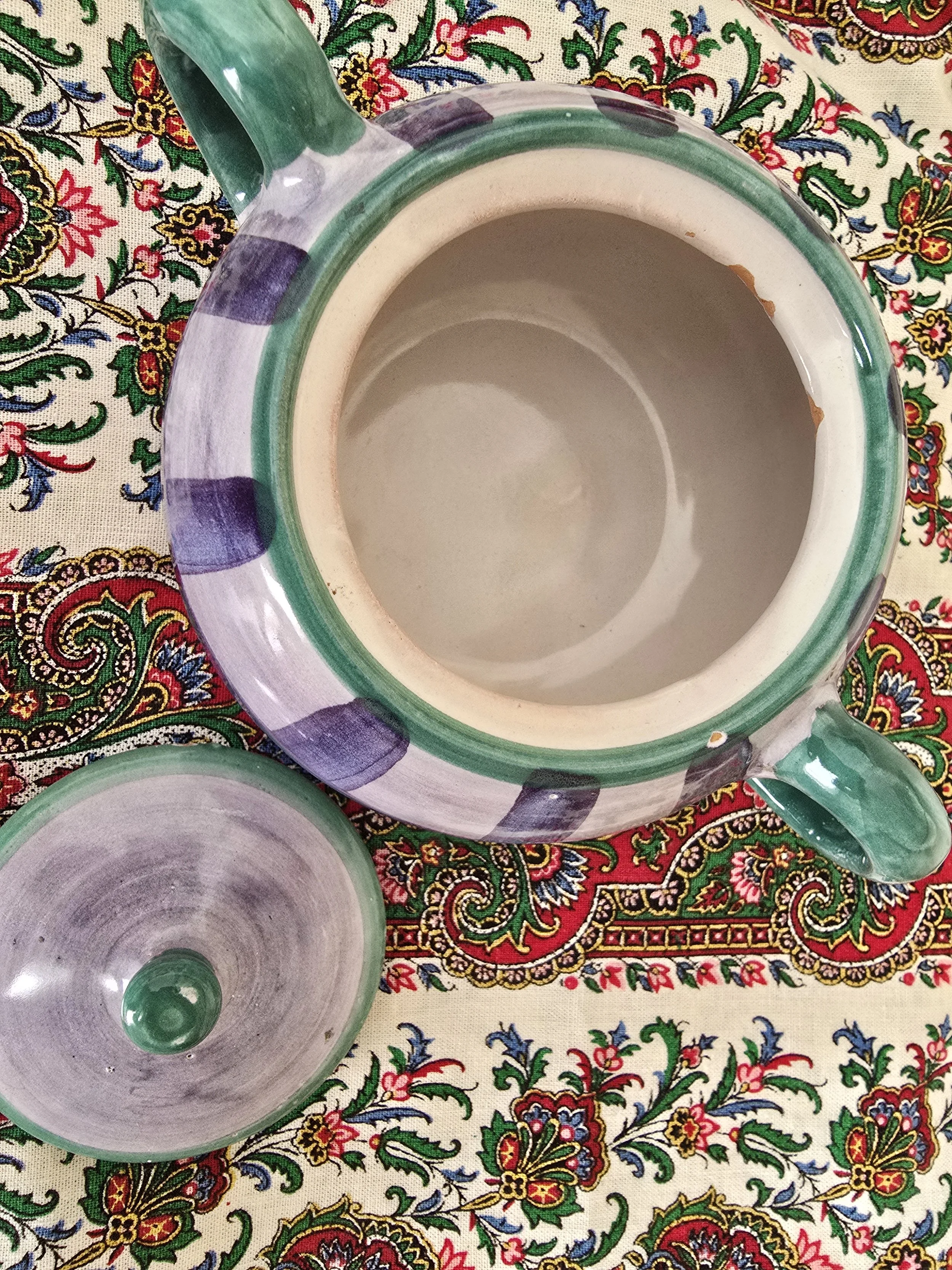 Interior detail of vintage Italian sugar bowl with green glaze