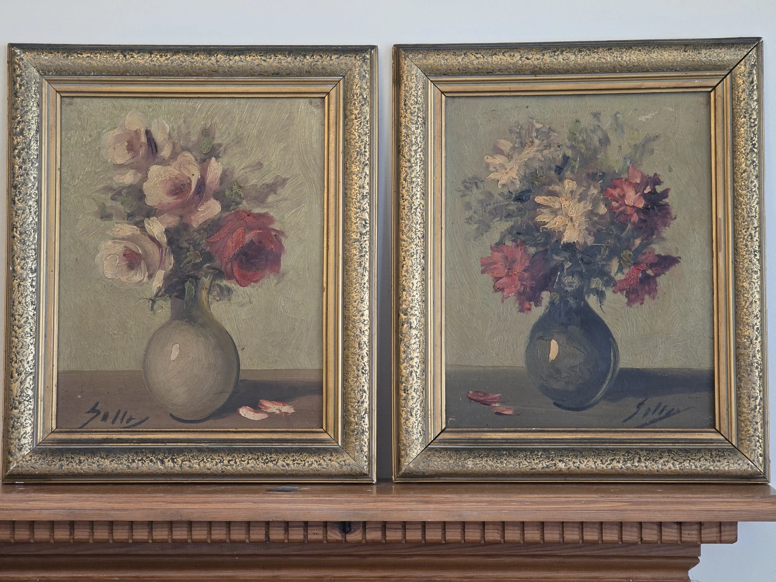 Pair of vintage French floral oil paintings in matching textured gilt frames