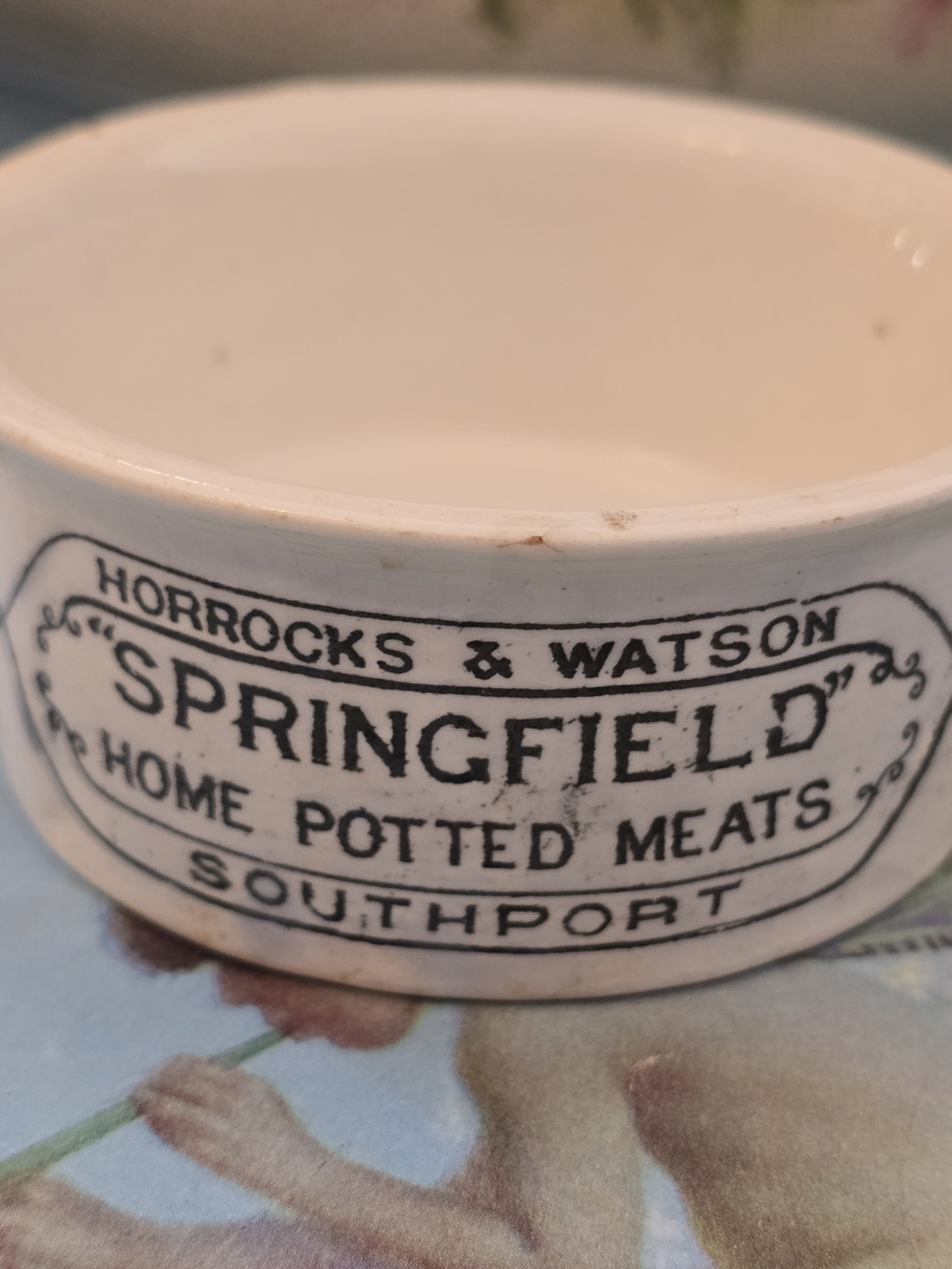 Close-up of original Horrocks and Watson lettering printed on an antique ceramic food pot