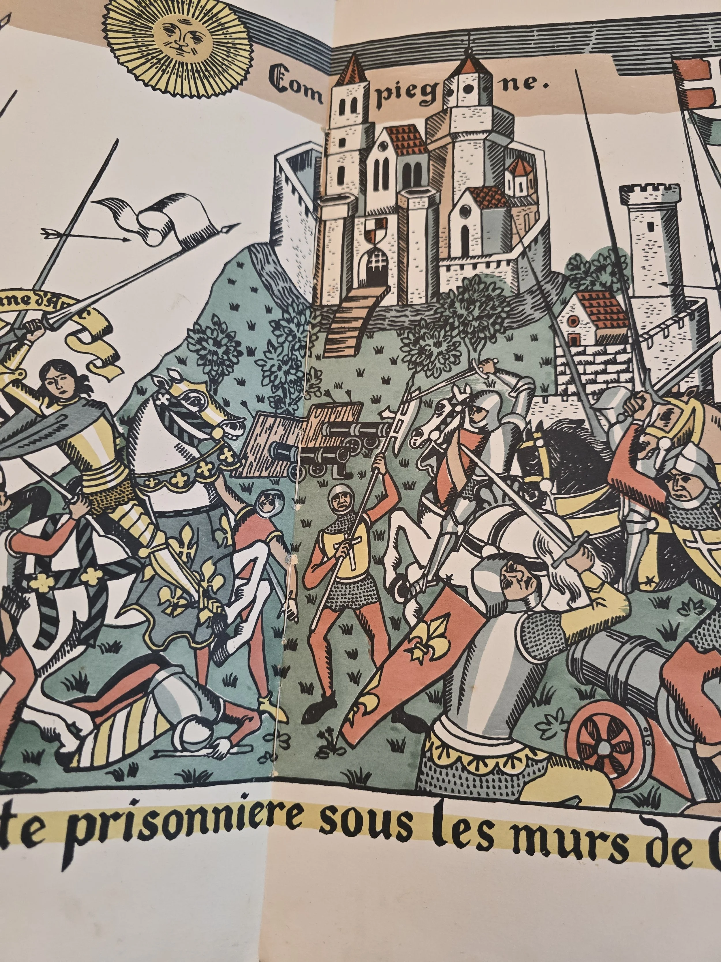 Collectible French illustrated book with illuminated manuscript style artwork and typography (Copy)