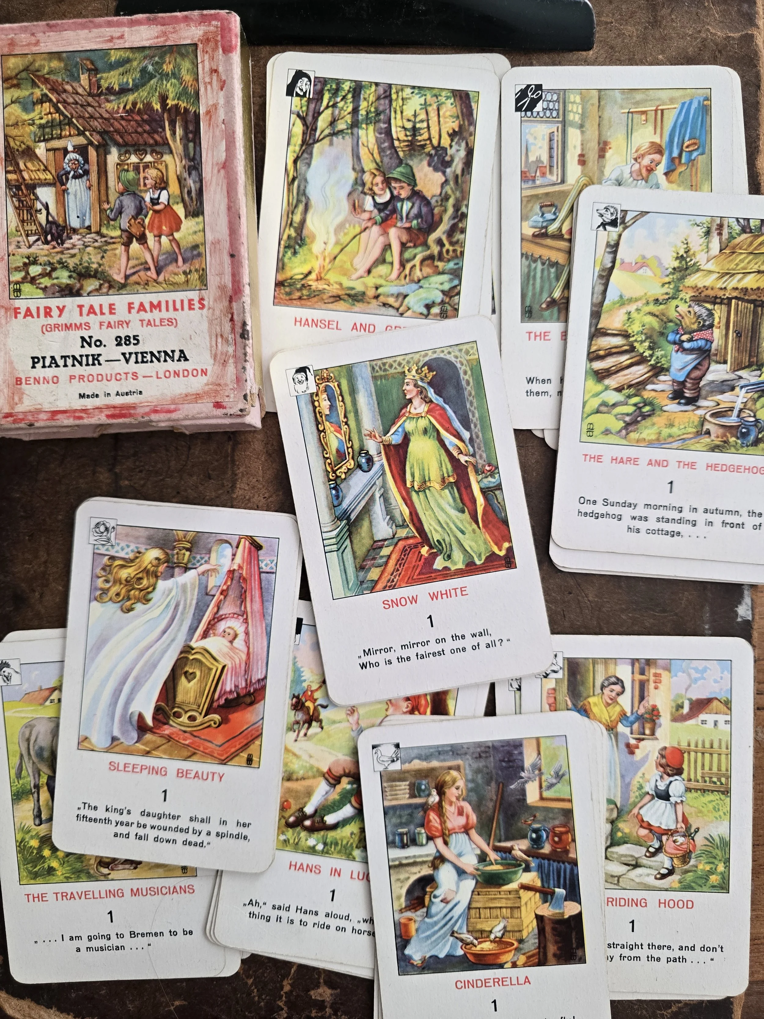 Vintage fairy tale cards showing Cinderella, Little Red Riding Hood and Snow White illustrations.