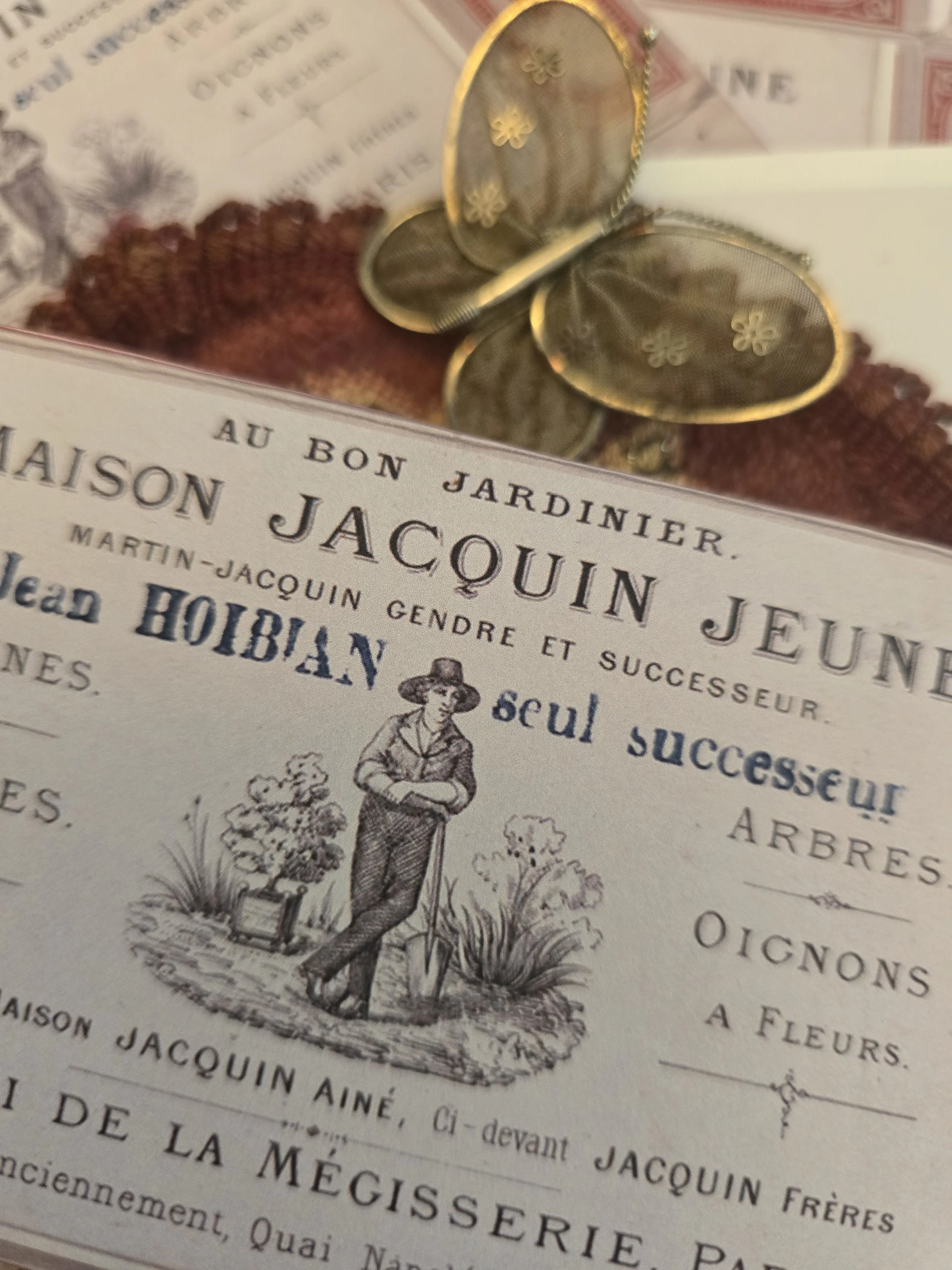Close-up of antique French Maison Jacquin Jeune seed merchant imagery on a handmade Pomme de Jour box.