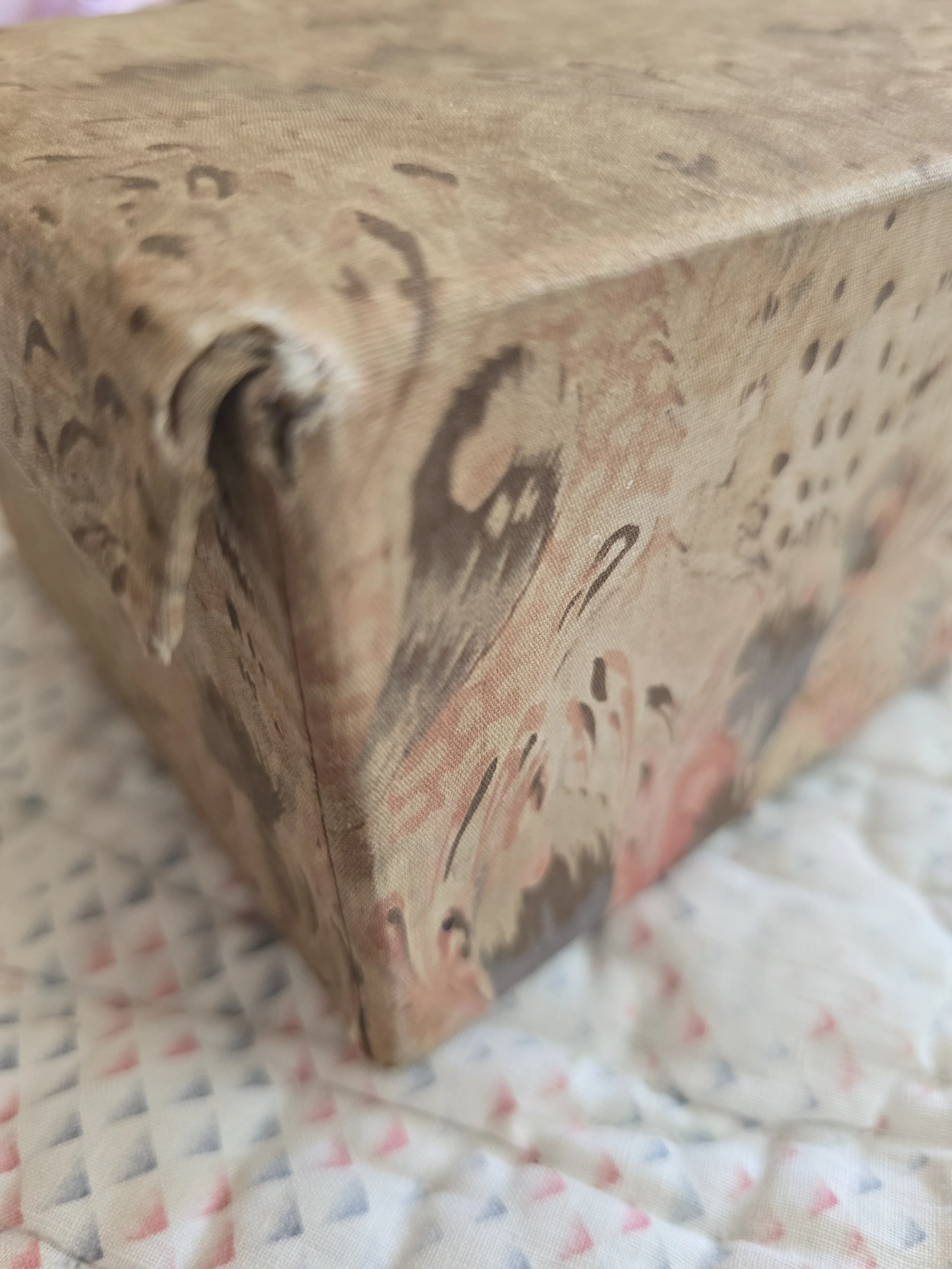 Quiet Edit storage box with age-softened textile covering and removable lid.