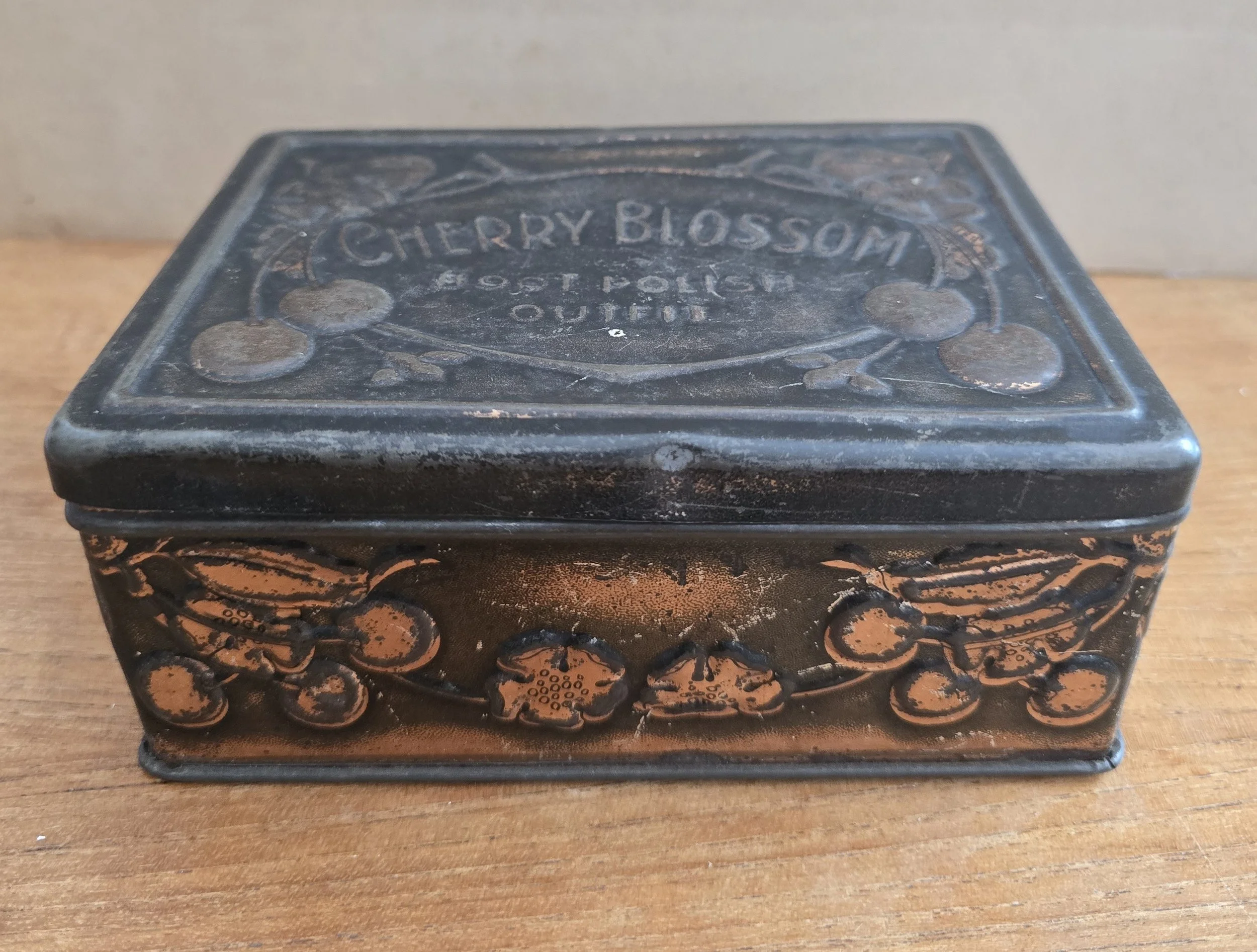 Antique Cherry Blossom Boot Polish Outfit embossed metal tin.