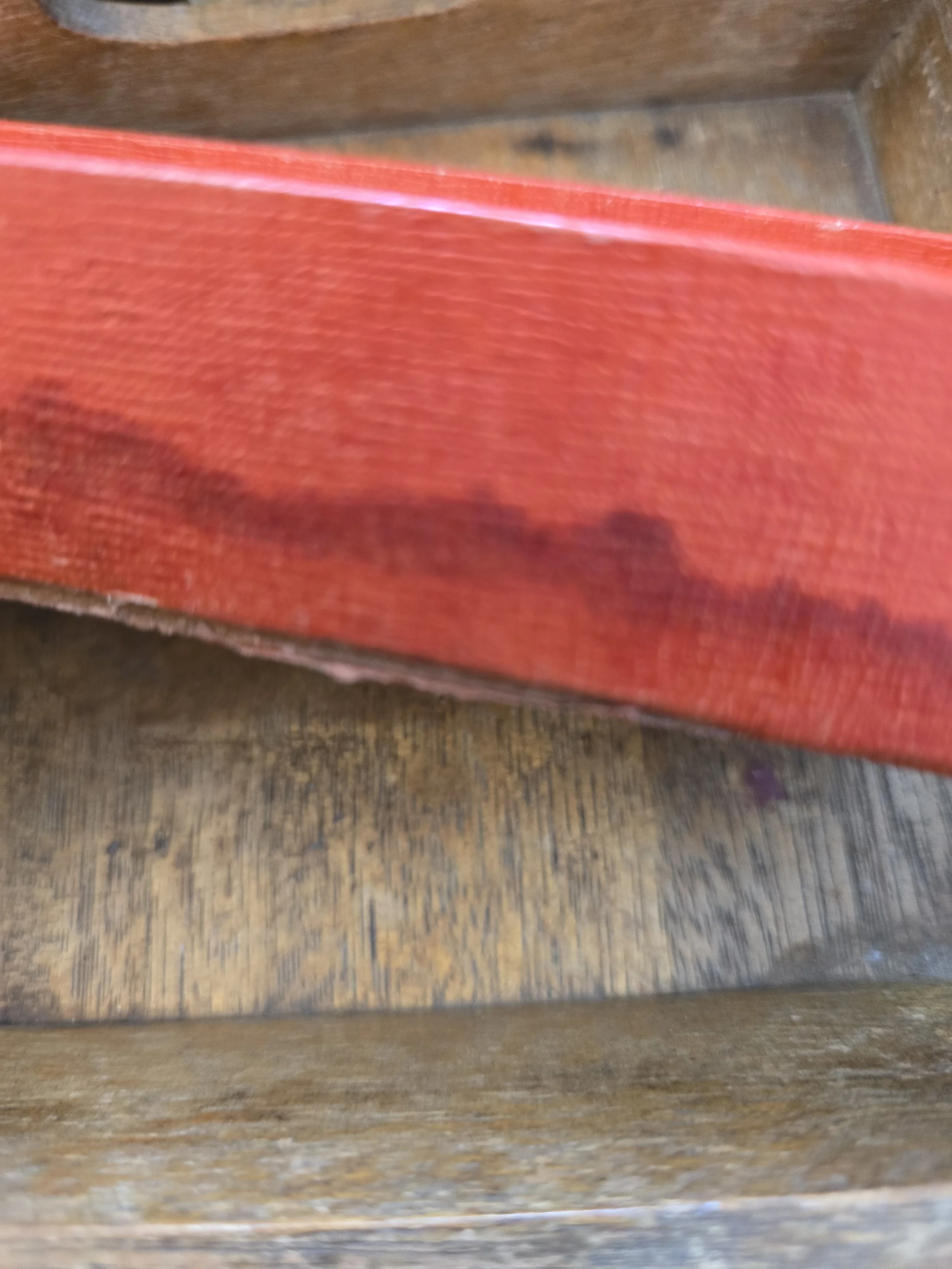Original red draughts box showing age and wear