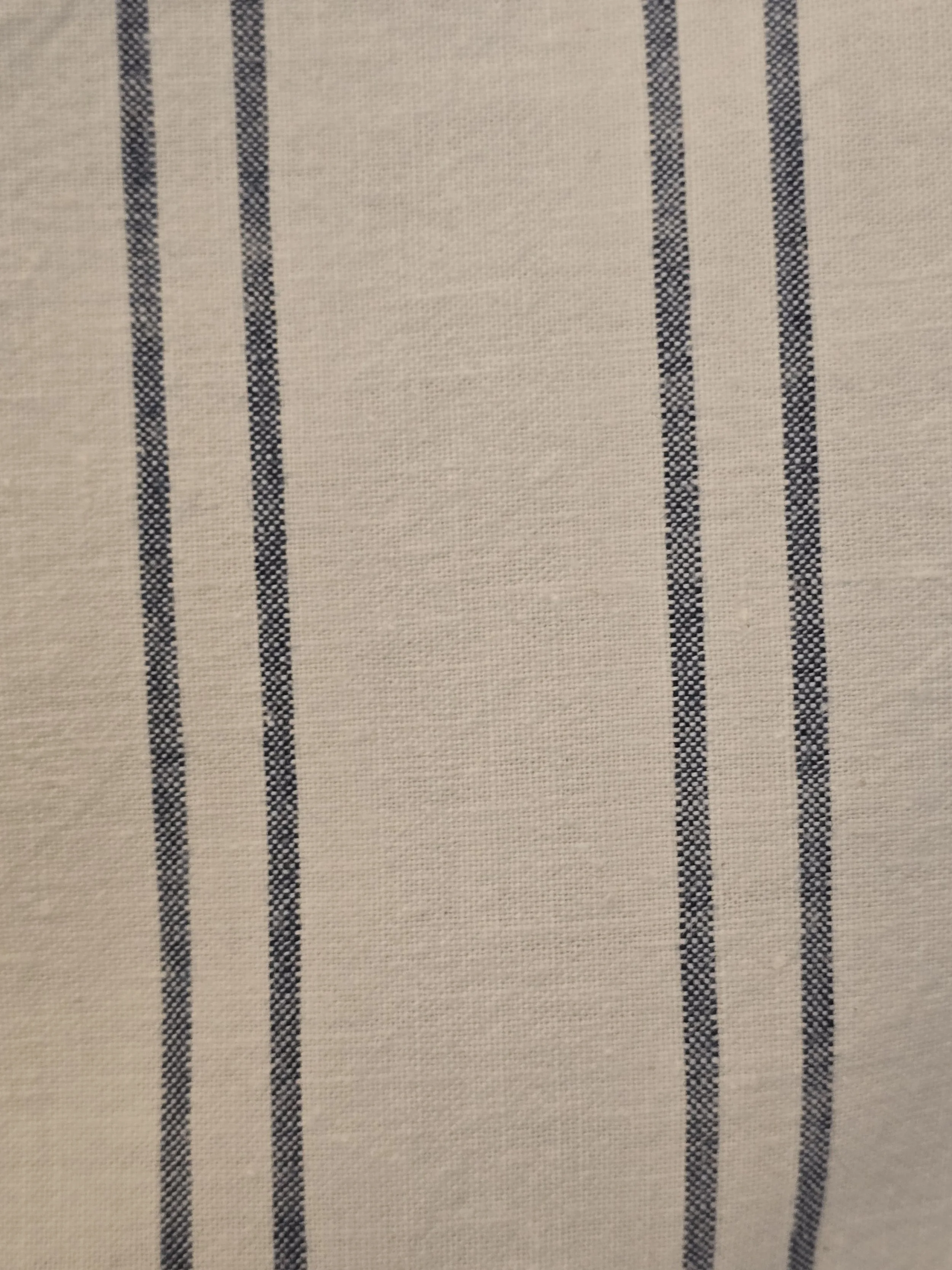 Detail showing the original seam where two narrower widths of cloth have been joined together.